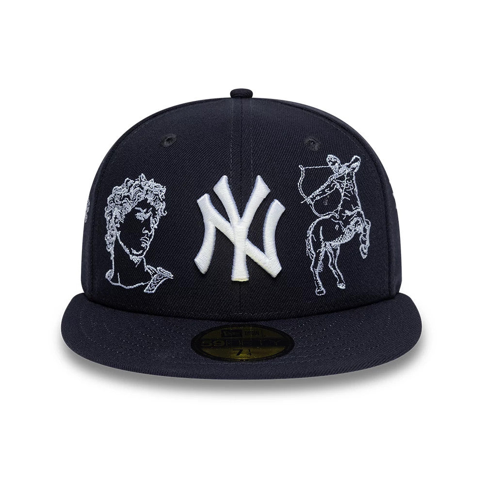 New York Yankees MLB Mythical Navy New Era 59FIFTY Fitted Cap, front view showing a white embroidered New York Yankees logo, decorative mythical graphics on either side, and a navy flat visor with a gold 59FIFTY size sticker on top.
