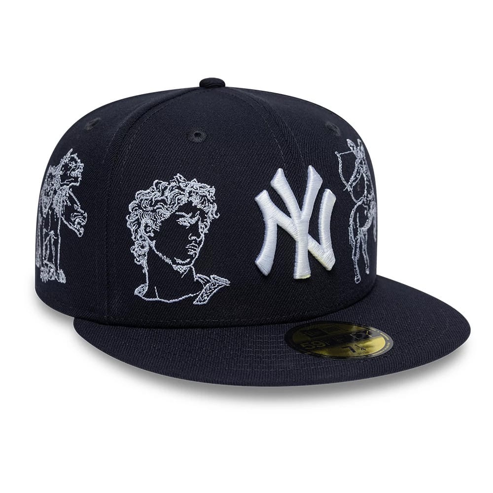 New York Yankees MLB Mythical Navy New Era 59FIFTY Fitted Cap, front view showing a prominent raised white NY logo on the front panel, intricate white mythical embroidery on side panels, and a gold 59FIFTY size sticker on the visor.