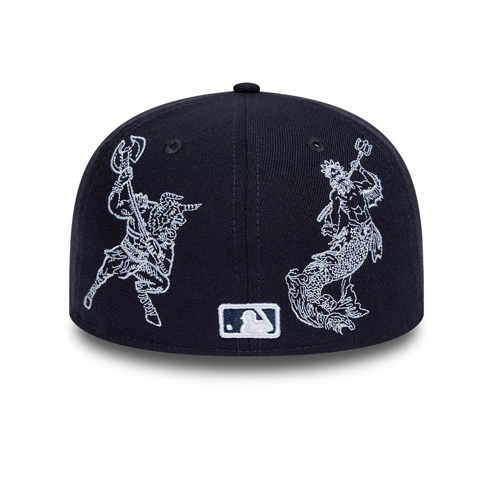 New York Yankees MLB Mythical Navy New Era 59FIFTY Fitted Cap, rear view showing intricate white embroidered mythical graphics on the back panels, set above the MLB Batterman logo centred at the bottom of the structured navy crown.