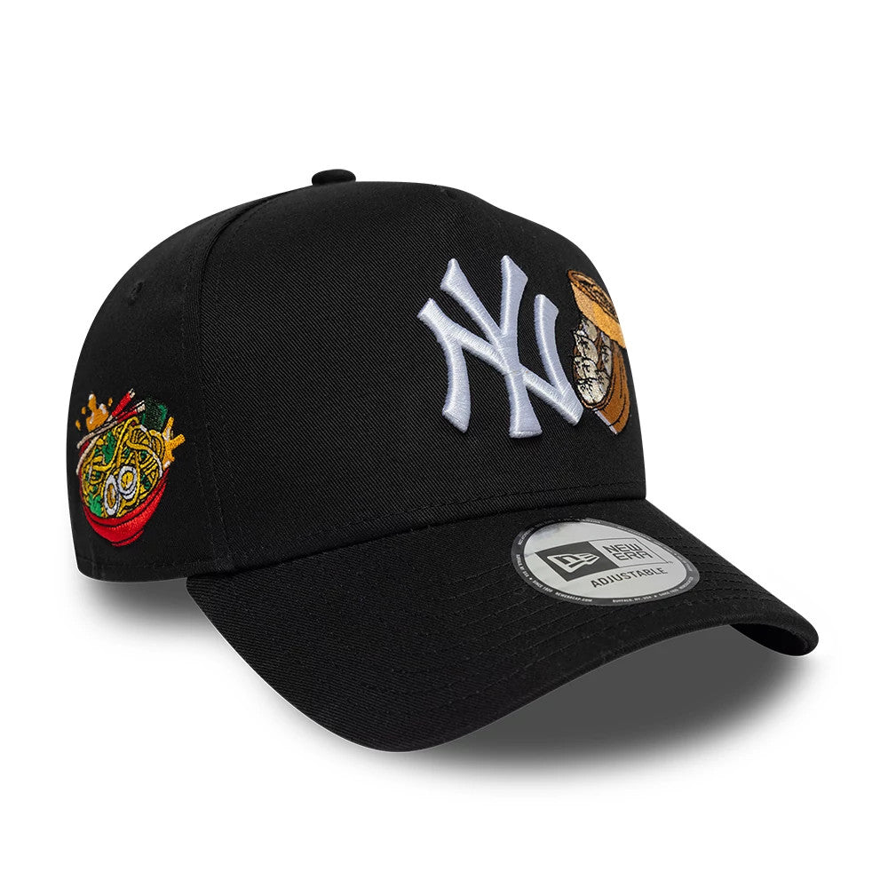 New York Yankees MLB Food Black New Era 9FORTY A-Frame Adjustable Cap, front view showing the prominent white embroidered NY logo, a detailed food graphic on the right front panel, and a 9FORTY size sticker on the curved black visor.