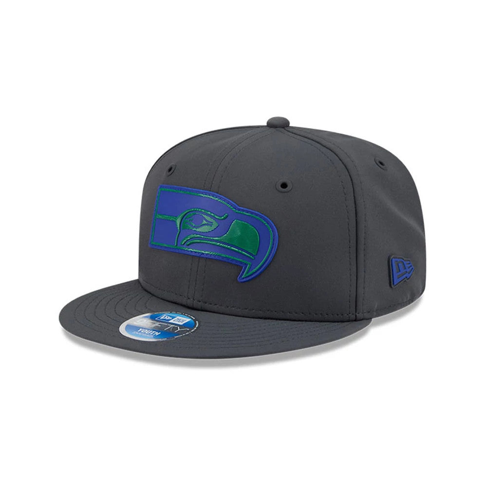 Seahawks Youth NFL Sideline 2026 Charcoal New Era 9FIFTY Snapback Adjustable Cap, front view showing a raised blue and green Seahawks logo on the front panel, a structured charcoal crown, flat visor with a blue-silver 9FIFTY size sticker.