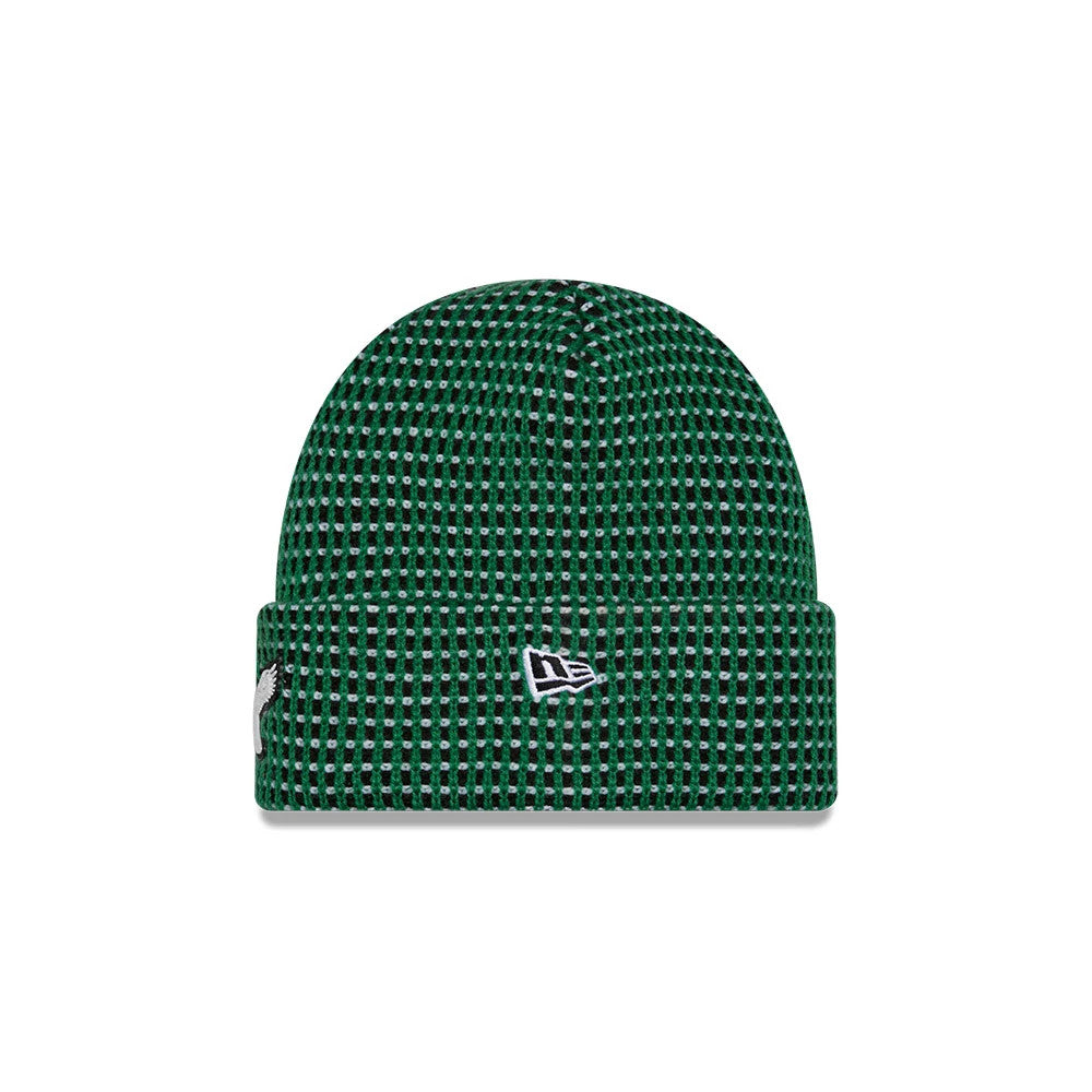 New Era Philadelphia Eagles NFL Sideline 2026 Green Cuff Knit Beanie Hat, front view showing the green and black ribbed pattern on the knit fabric, with the embroidered New Era flag logo on the centre of the cuff.