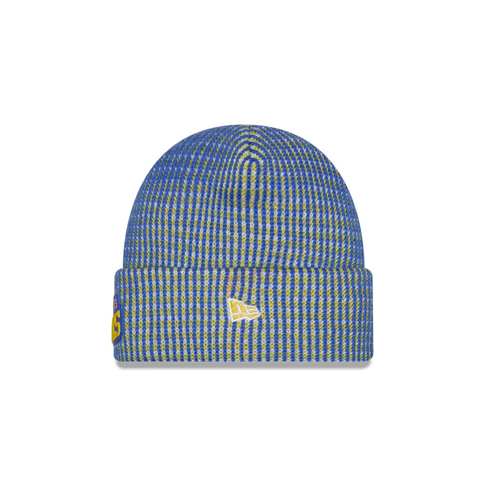 New Era LA Rams NFL Sideline 2026 Blue Cuff Knit Beanie Hat, front view showing a woven blue and yellow pattern, the white New Era flag logo embroidered on the cuff, and part of the Rams logo on the side.