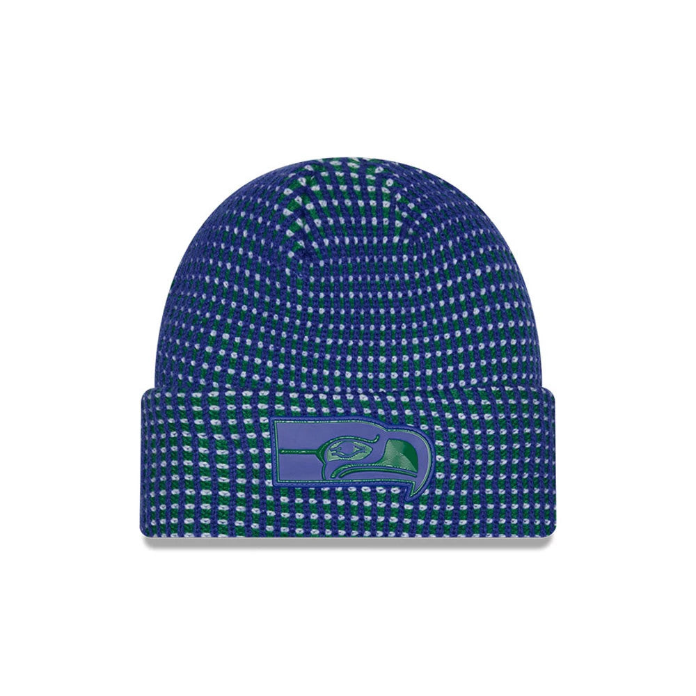 New Era Seattle Seahawks NFL Sideline 2026 Blue Cuff Knit Beanie Hat, front view showing a raised embroidered Seahawks logo in blue and green on the cuff, with a textured blue and green knit pattern covering the entire hat.