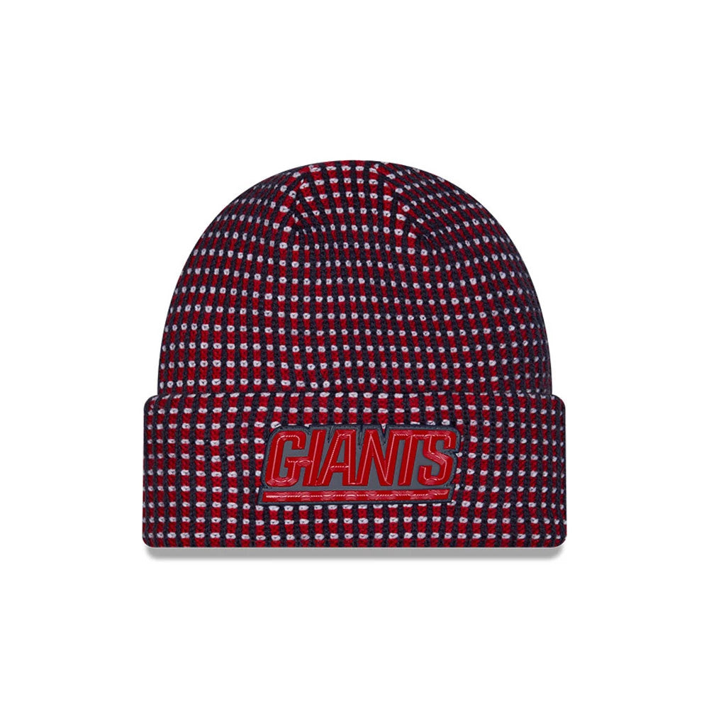 New Era New York Giants NFL Sideline 2026 Dark Blue Cuff Knit Beanie Hat, front view showing a red embroidered Giants wordmark logo on the cuff, with an intricate dark blue and red checkered knit pattern covering the entire beanie.