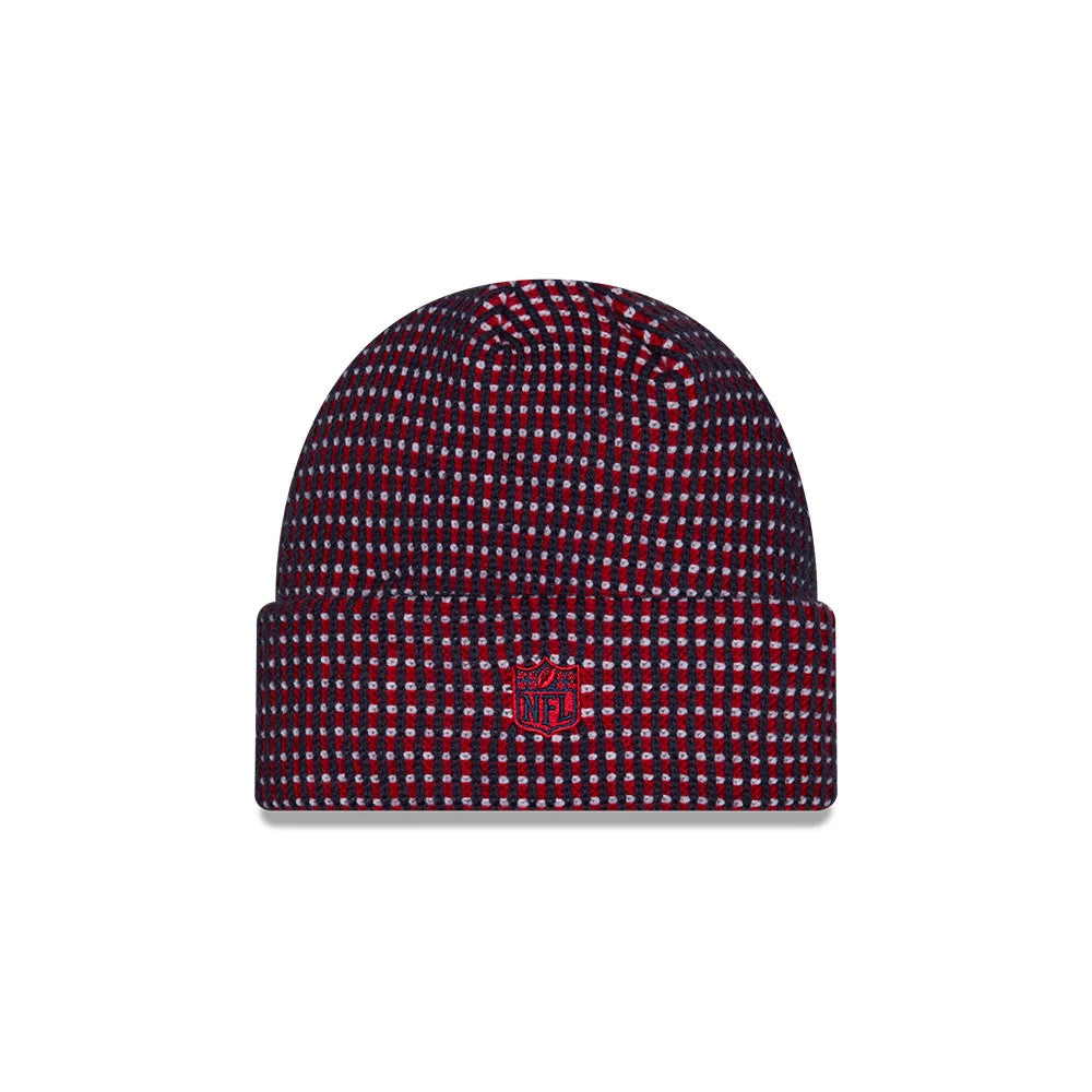 New Era New York Giants NFL Sideline 2026 Dark Blue Cuff Knit Beanie Hat, front view showing the red embroidered NFL shield logo on the fold, with a dark blue and red checkered knit pattern covering the entire beanie.