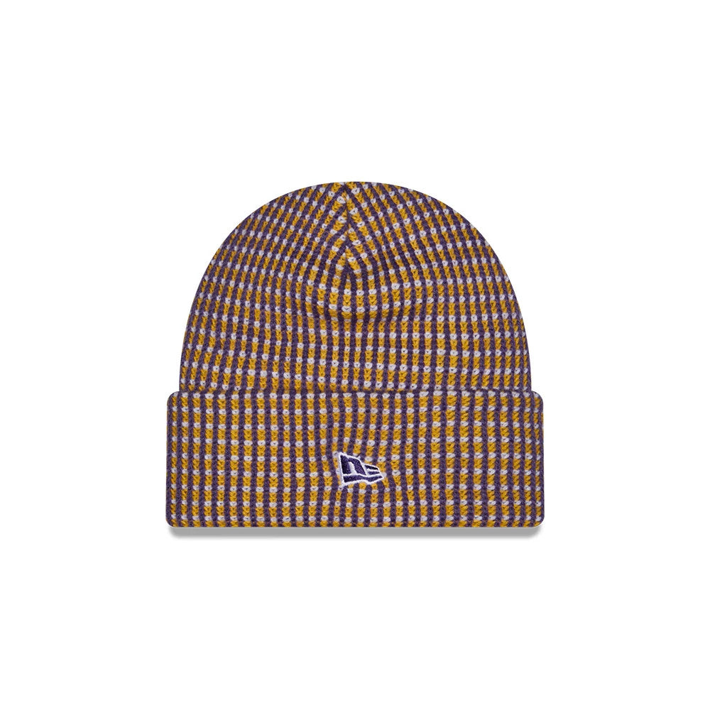 New Era Minnesota Vikings NFL Sideline 2026 Yellow Cuff Knit Beanie Hat, front view showing a textured pattern in purple and yellow vertical stripes, with the New Era flag logo embroidered on the front of the cuff in purple and white stitching.