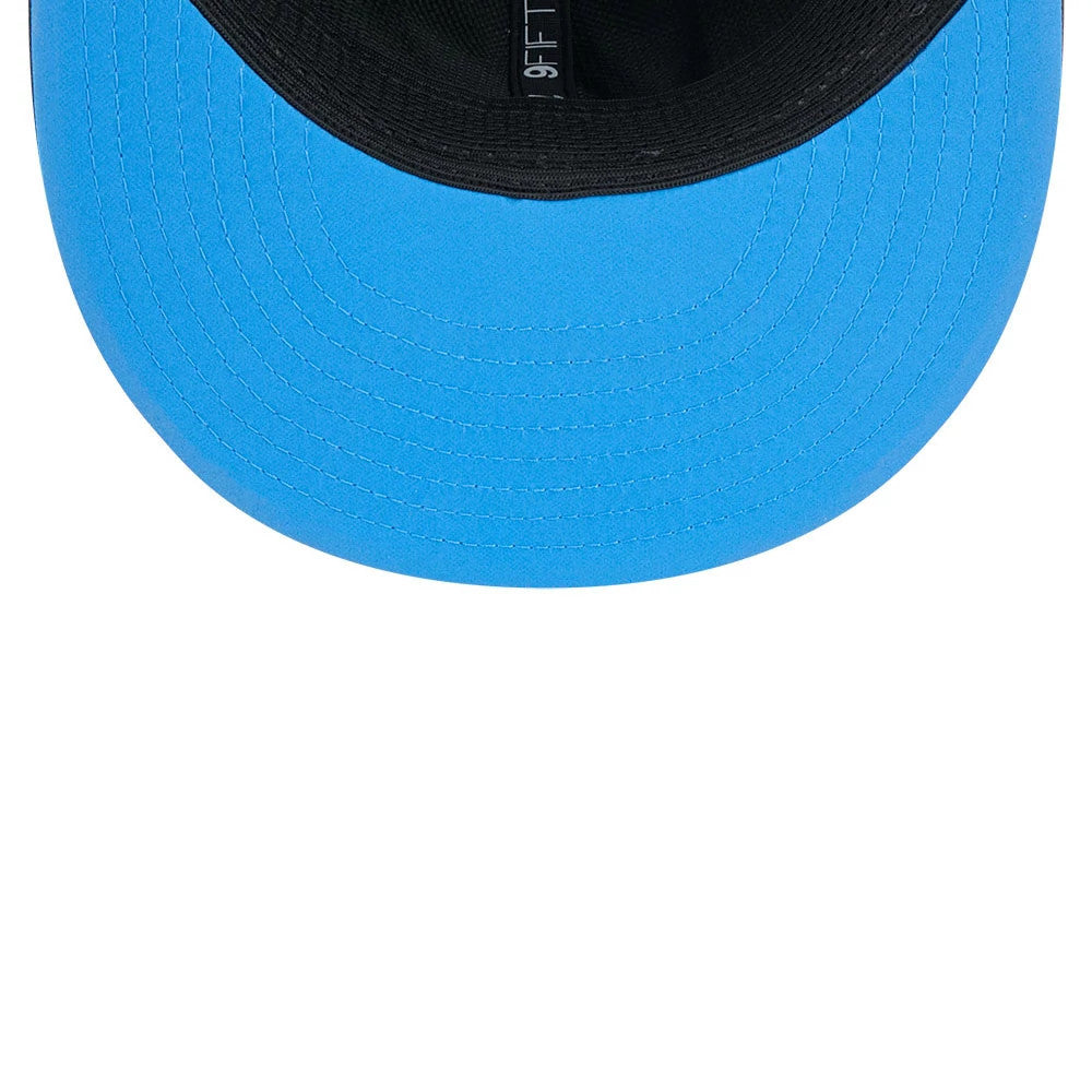 LA Chargers NFL Sideline 2026 Charcoal New Era 9FIFTY Snapback Adjustable Cap, inside view showing the bright blue undervisor, black sweatband with the 9FIFTY label, and detailed internal stitching on the structured crown.