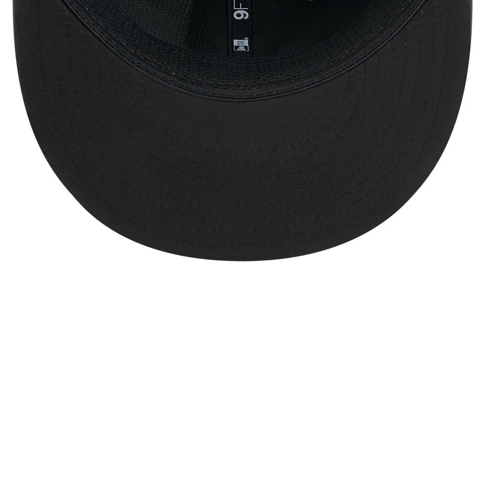 Seahawks NFL Sideline 2026 Charcoal New Era 9FIFTY Snapback Adjustable Cap, inside view showing the black undervisor with detailed stitching, a 9FIFTY size tag on the taping, and a flat black sweatband encircling the interior.