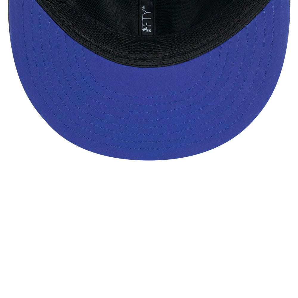 Denver Broncos NFL Sideline 2026 Charcoal New Era 9FIFTY Snapback Adjustable Cap, inside view showing a contrasting royal blue undervisor, a black sweatband with a small woven label, and black internal taping with white 9FIFTY branding.