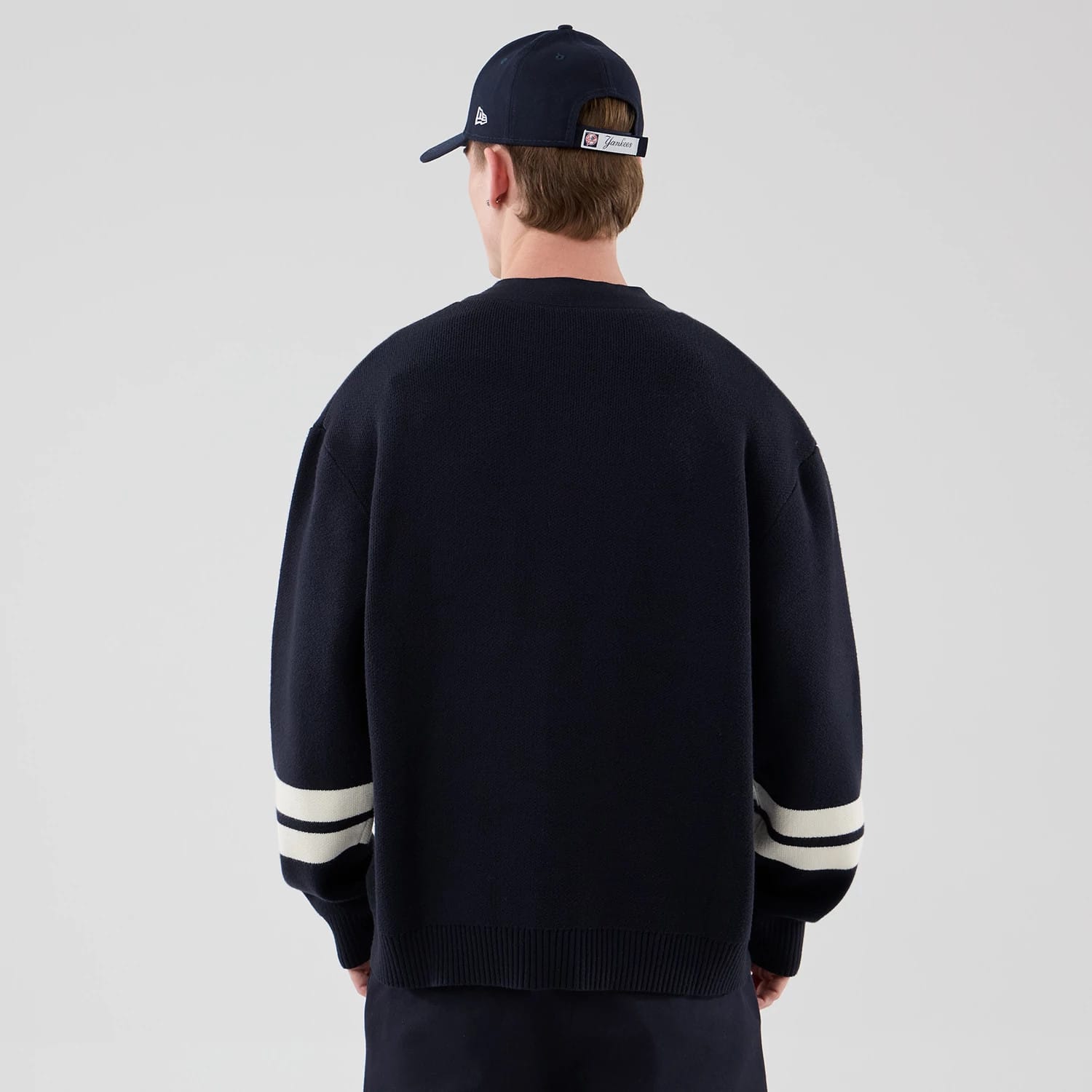 The model is wearing this MLB Knit New York Yankees Cardigan in navy. 2