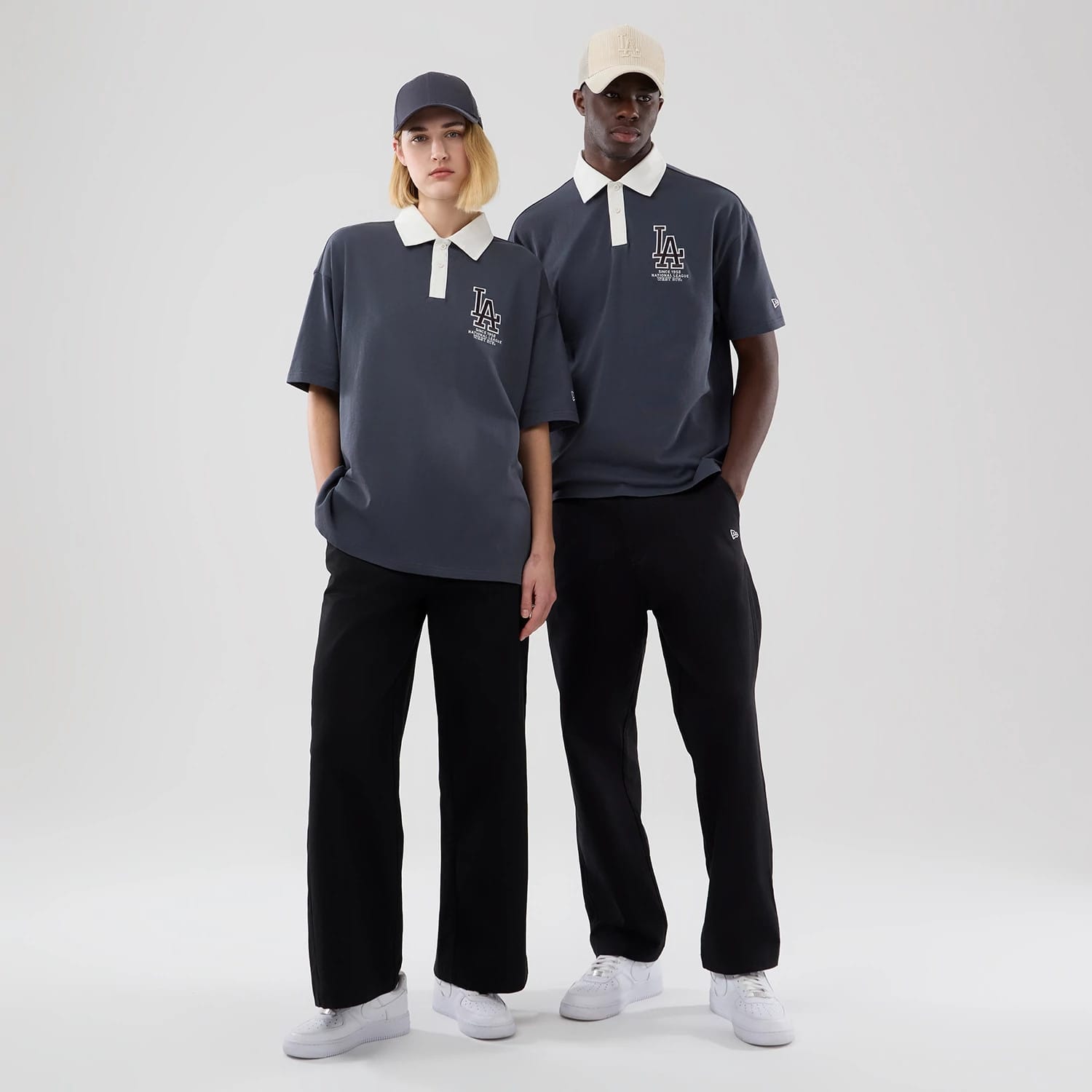 The model is wearing this MLB LA Dodgers Polo T-Shirt in grey. 1