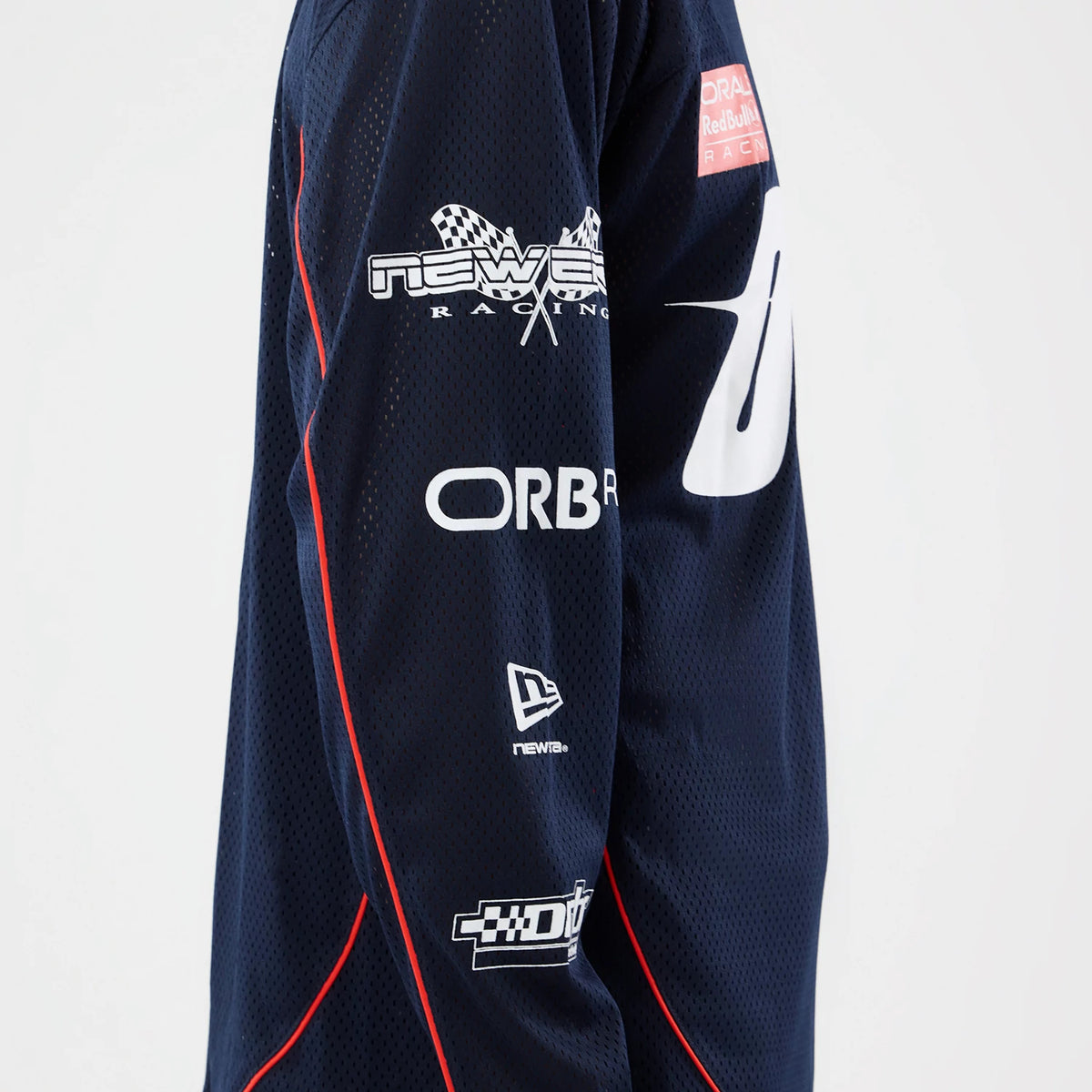 The model is wearing this Red Bull Racing Hockey Jersey in dark blue. 3