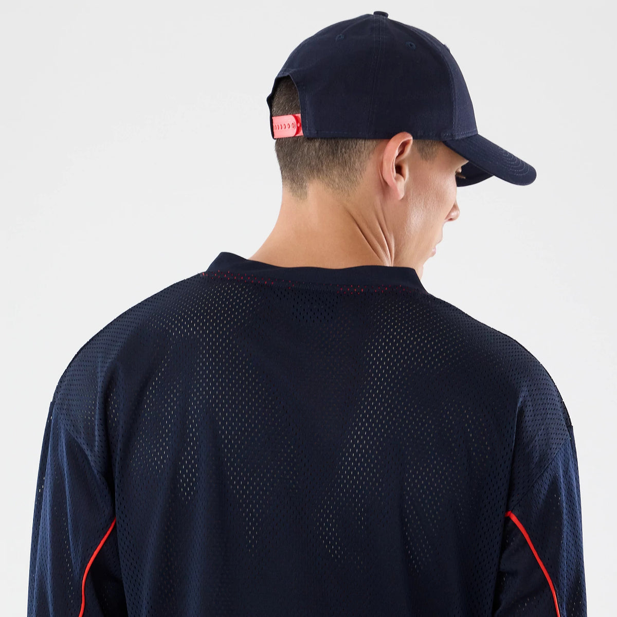 The model is wearing this Red Bull Racing Hockey Jersey in dark blue. 7
