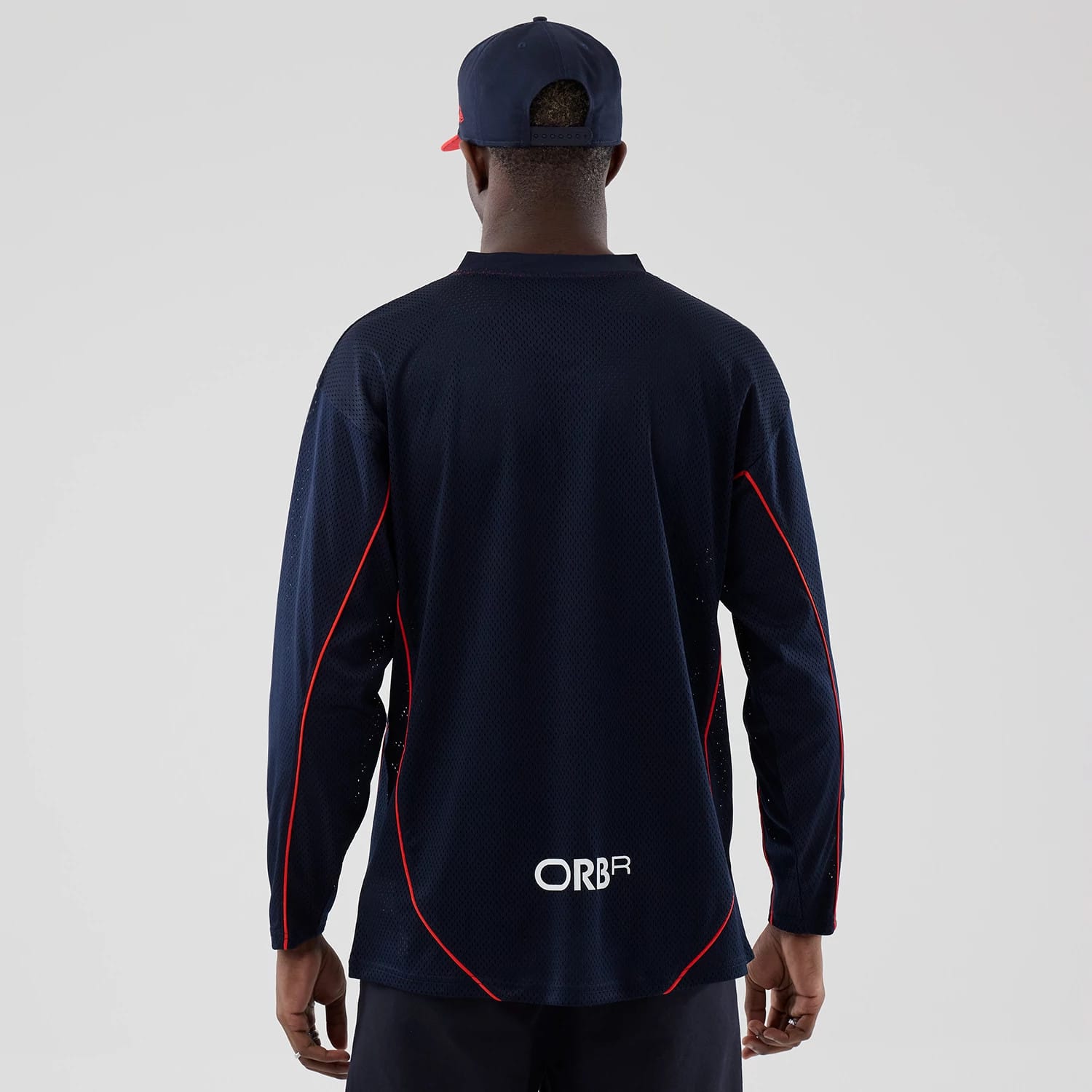 The model is wearing this Red Bull Racing Hockey Jersey in dark blue. 2