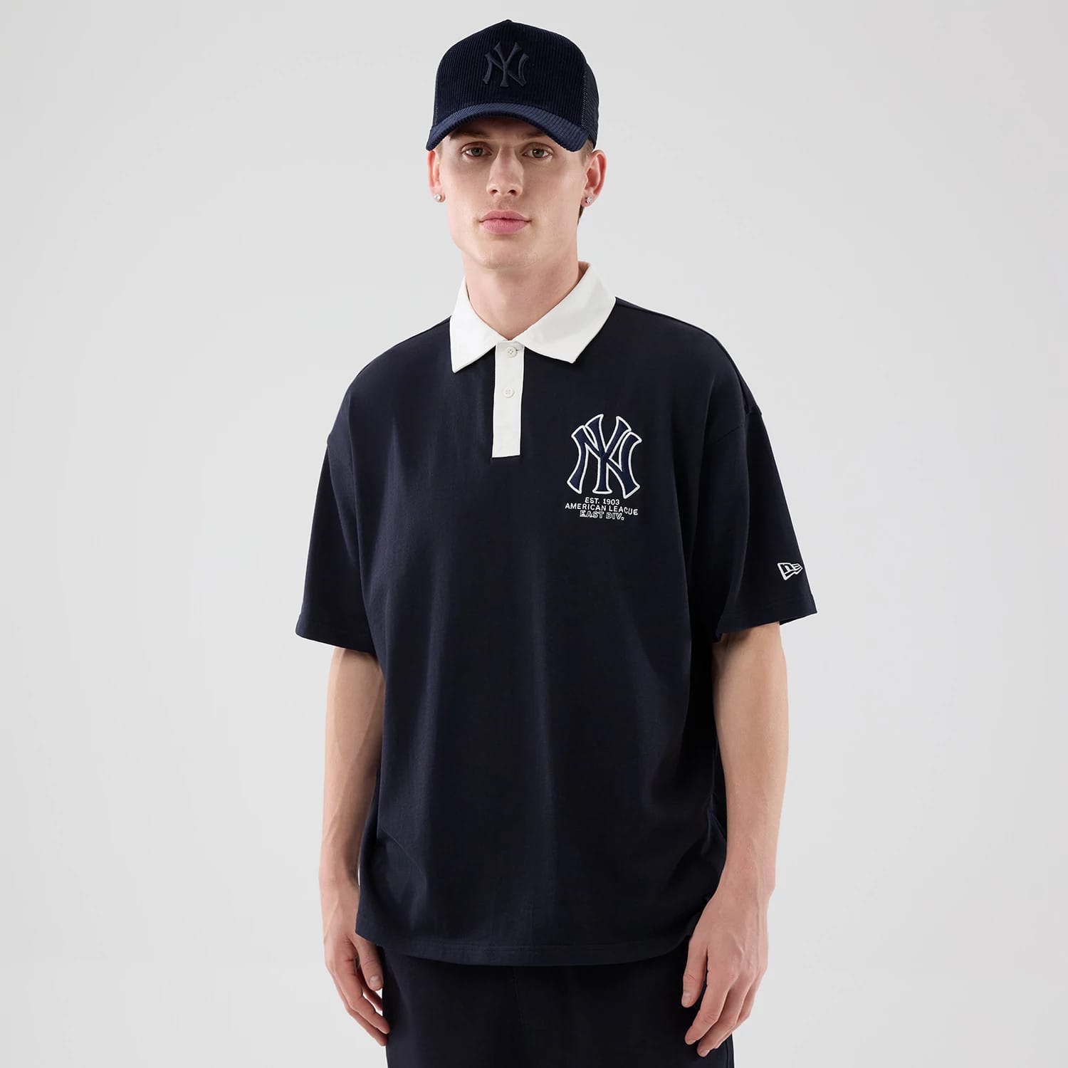 The model is wearing this MLB New York Yankees Polo T-Shirt in navy. 3