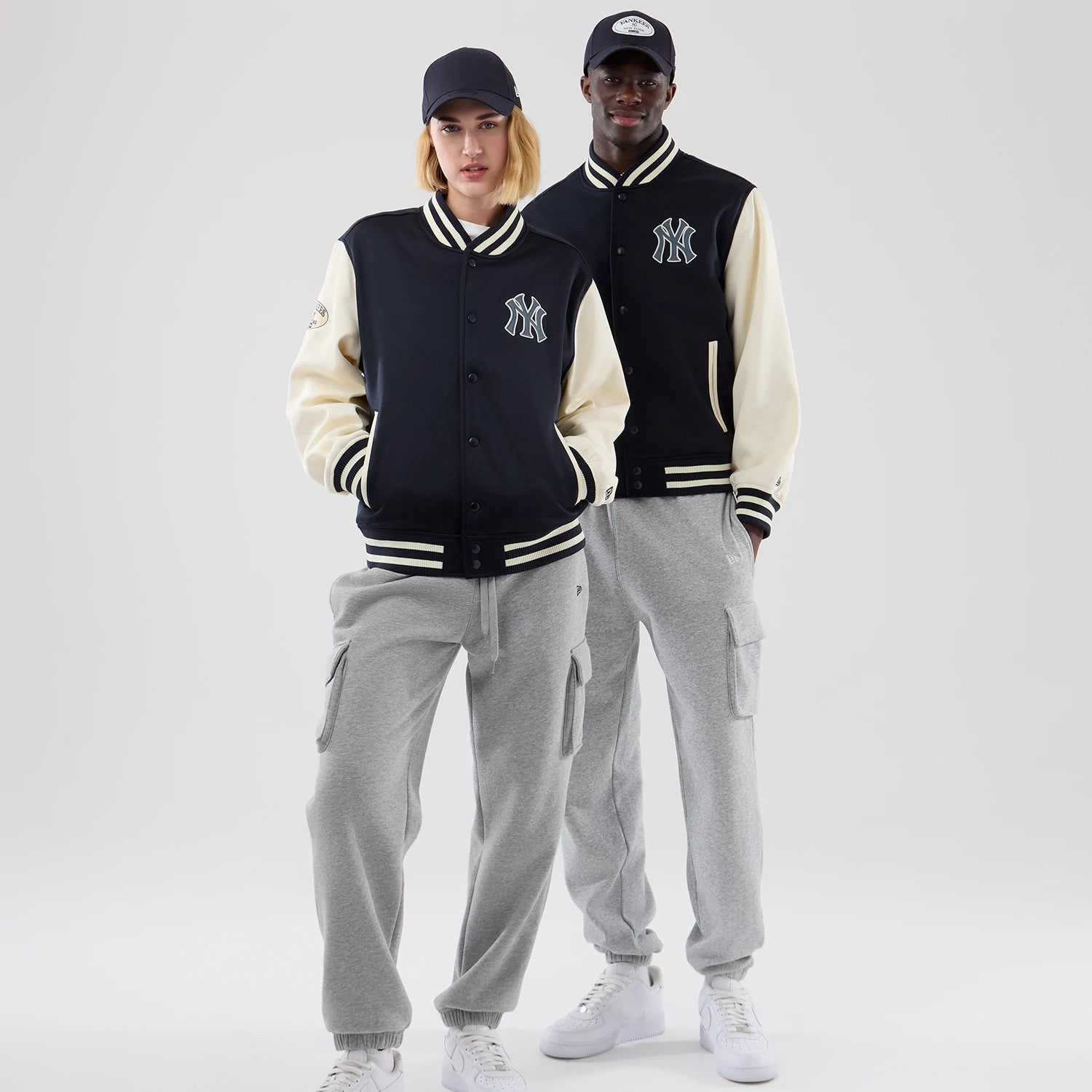 The model is wearing this MLB Jersey Bomber New York Yankees Jacket in navy. 1