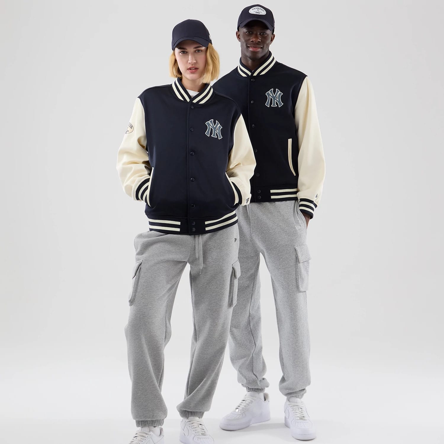 The model is wearing this MLB Jersey Bomber New York Yankees Jacket in navy. 1