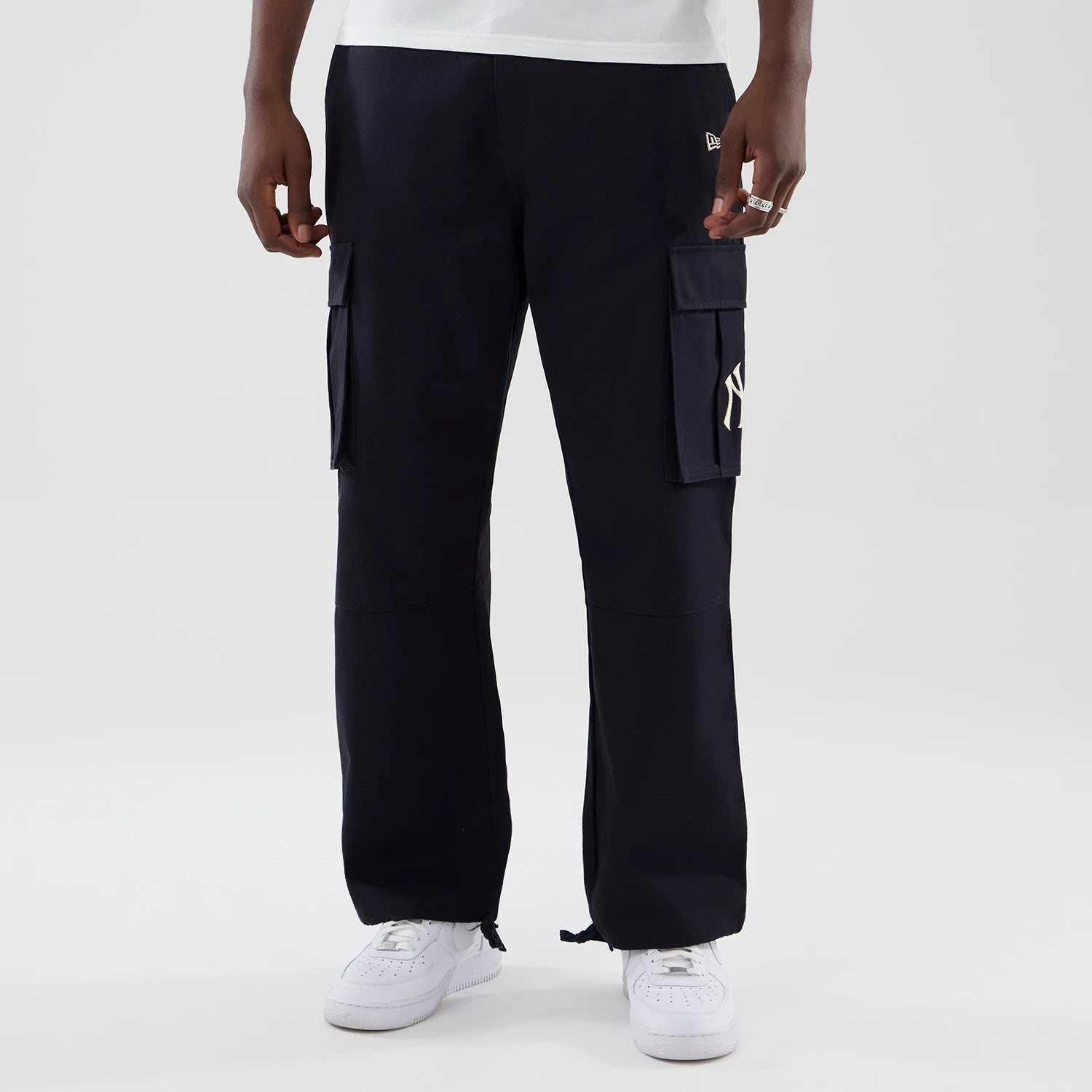 The model is wearing these MLB New York Yankees Cargo Trousers in navy. 1