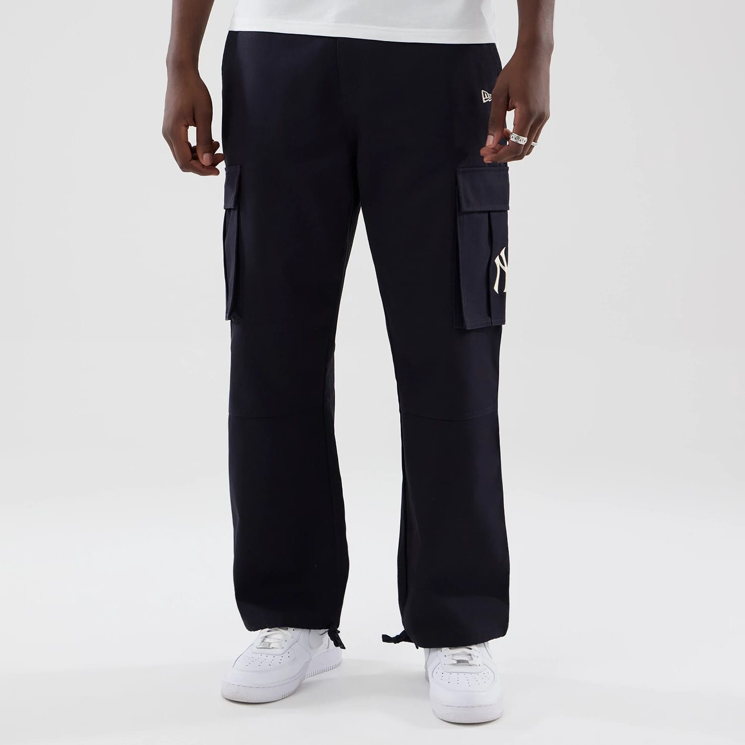 The model is wearing these MLB New York Yankees Cargo Trousers in navy. 1