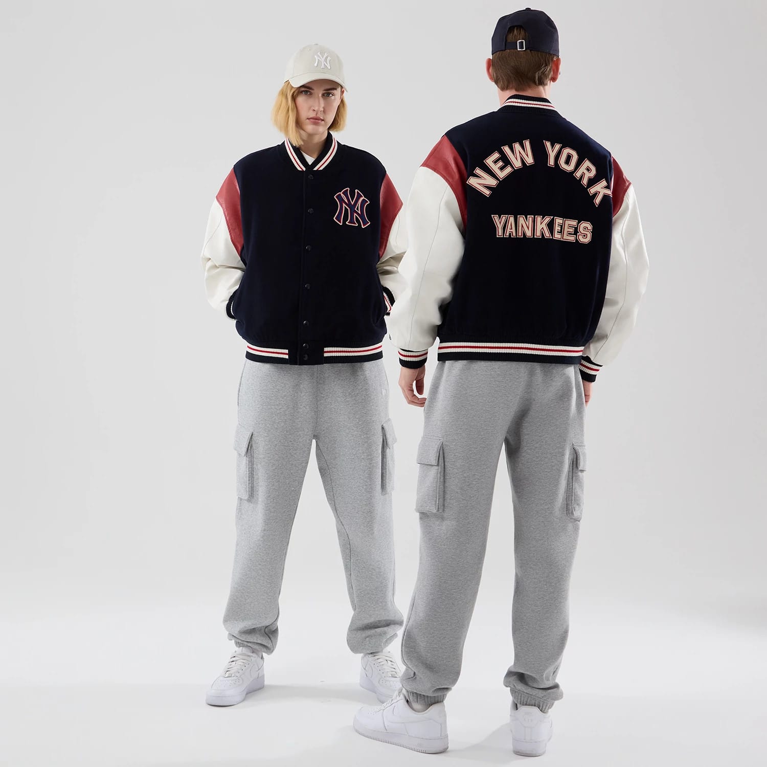 The model is wearing this MLB Varsity New York Yankees Jacket in navy. 1