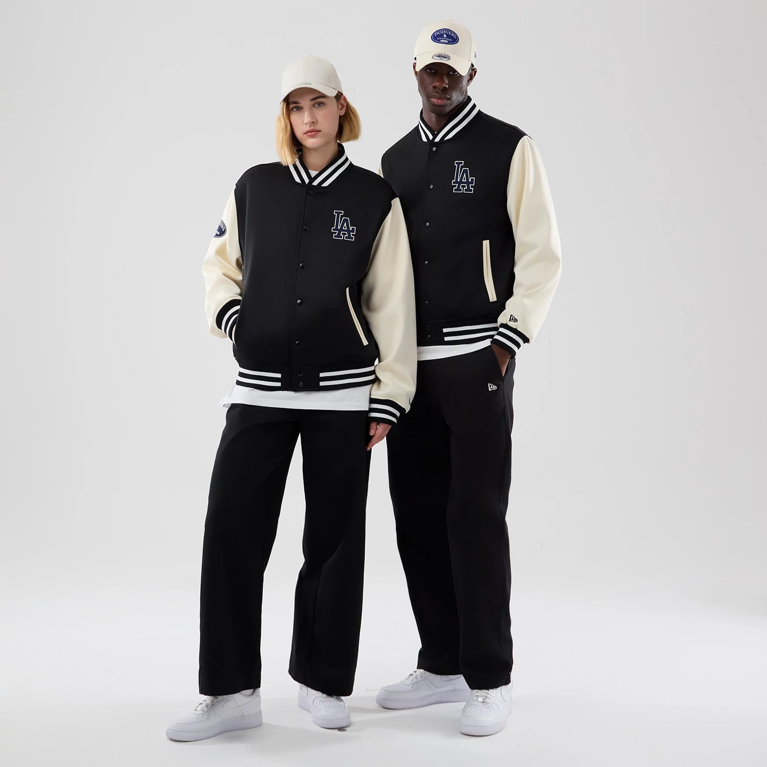 The model is wearing this MLB Jersey Bomber LA Dodgers Jacket in black. 1