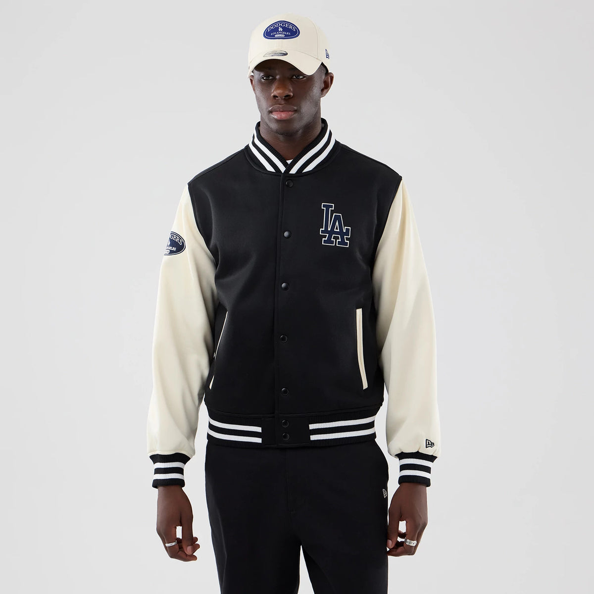 The model is wearing this MLB Jersey Bomber LA Dodgers Jacket in black. 3