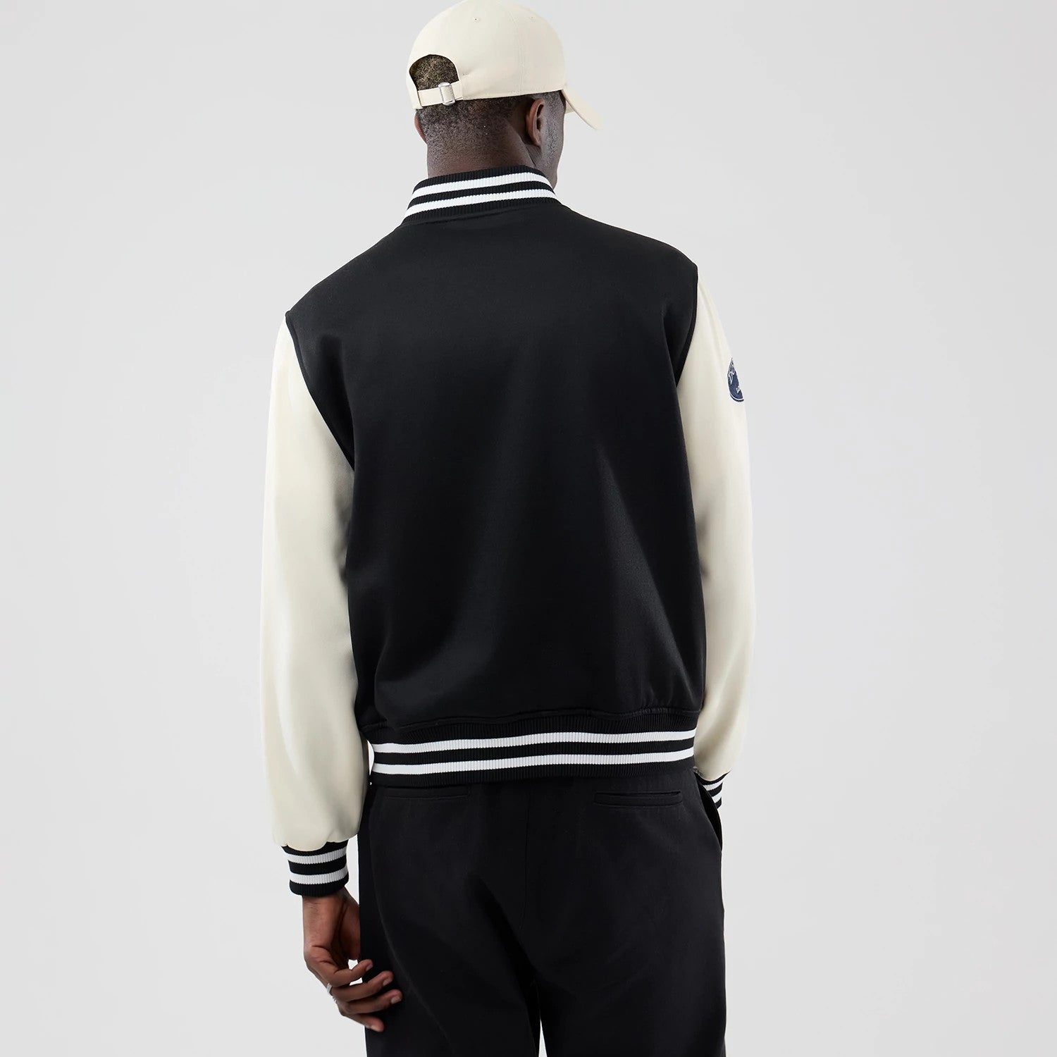 The model is wearing this MLB Jersey Bomber LA Dodgers Jacket in black. 2