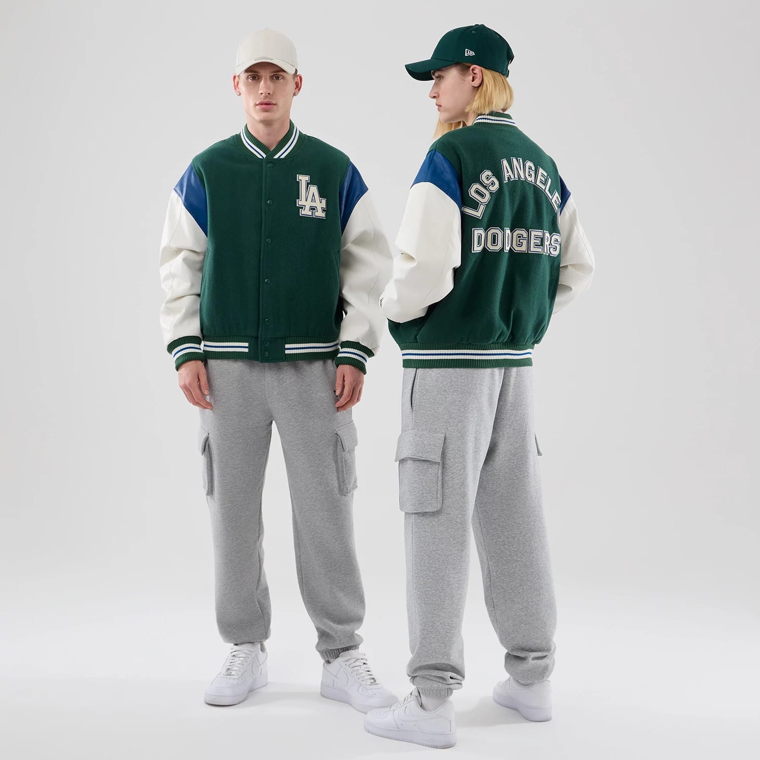 The model is wearing this MLB Varsity LA Dodgers Jacket in dark green. 1