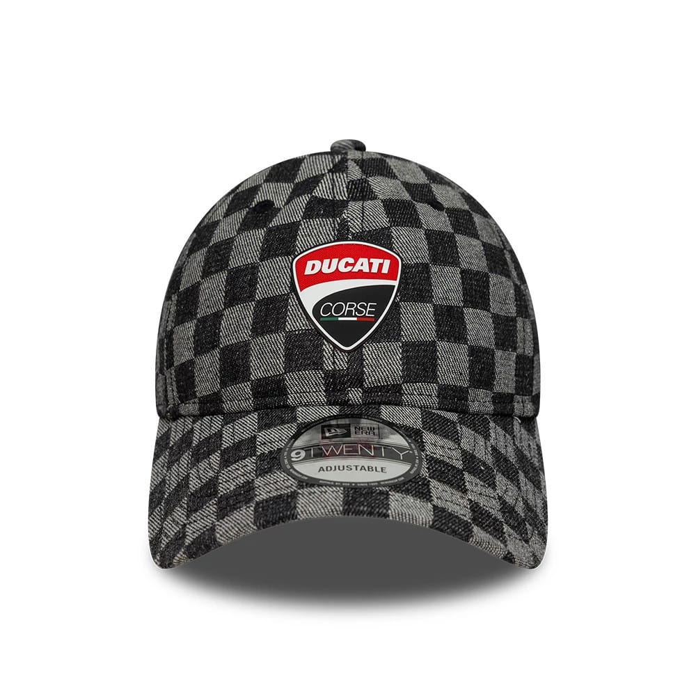 Ducati Motor All Over Print Black New Era 9TWENTY Adjustable Cap, front view showing the red and white Ducati Corse logo on the black and grey chequered front panel, with a curved visor and 9TWENTY size sticker.