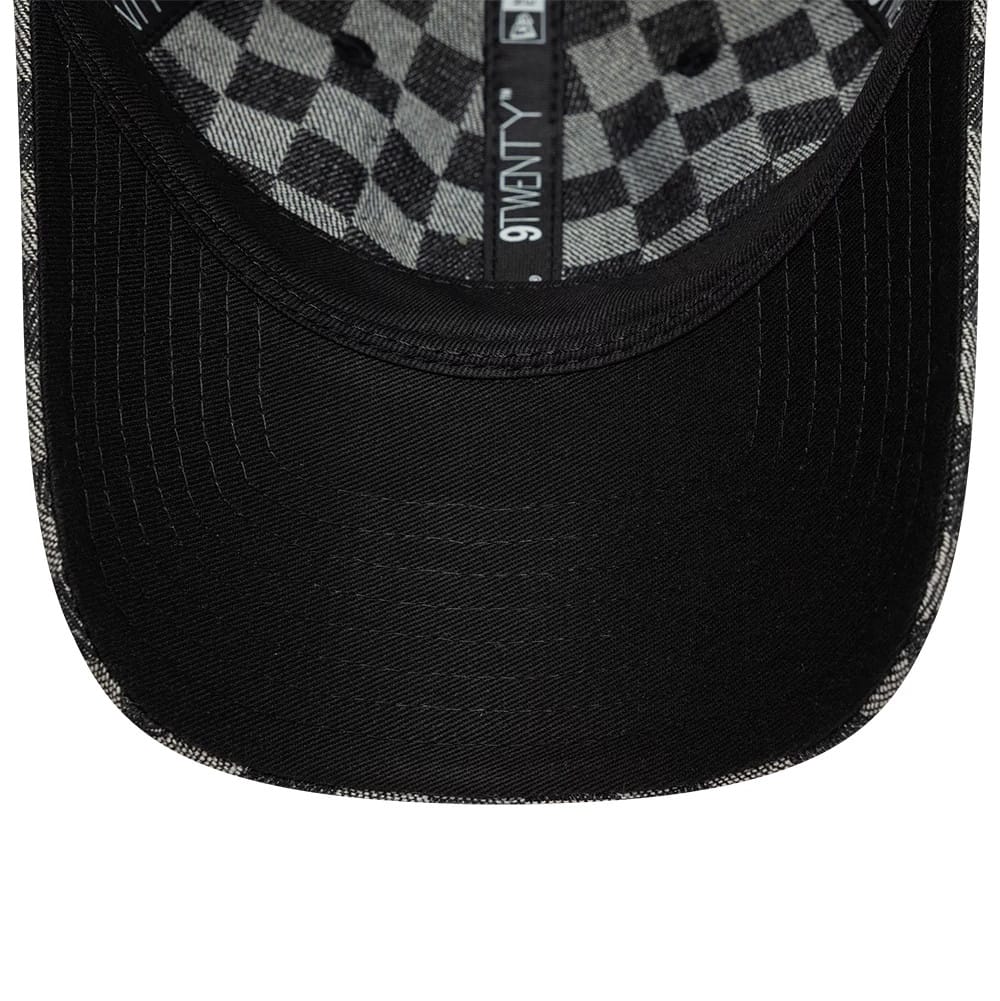 Ducati Motor All Over Print Black New Era 9TWENTY Adjustable Cap, inside view showing the black sweatband with New Era branding, black undervisor, and a distinctive chequered taping pattern lining the interior crown.