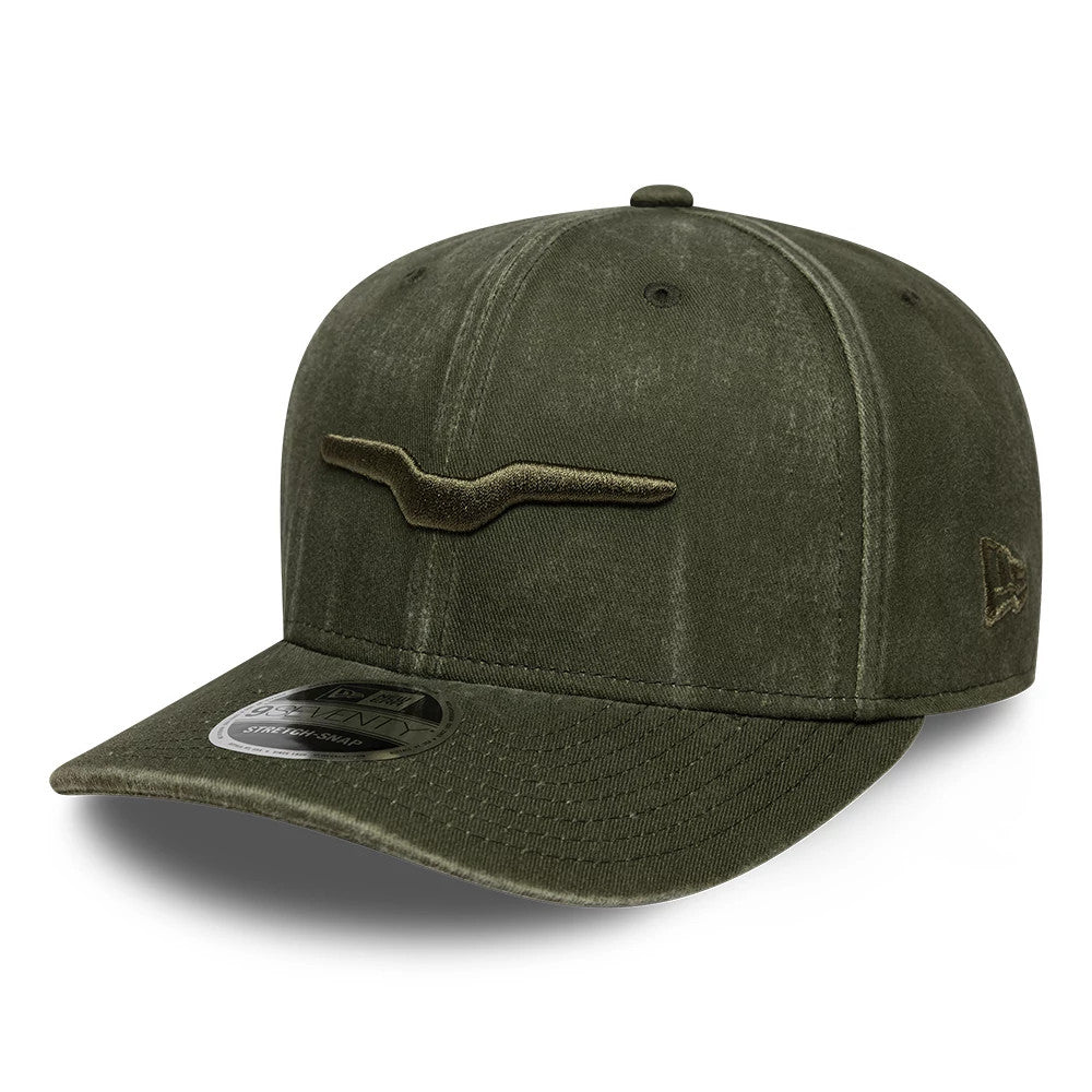 Moto Guzzi Logo Green New Era 9SEVENTY Stretch Snap Adjustable Cap, three-quarter view showing the embroidered brown Moto Guzzi logo on the front panel, a New Era flag logo on the left side, and a 9SEVENTY size sticker on the curved visor.