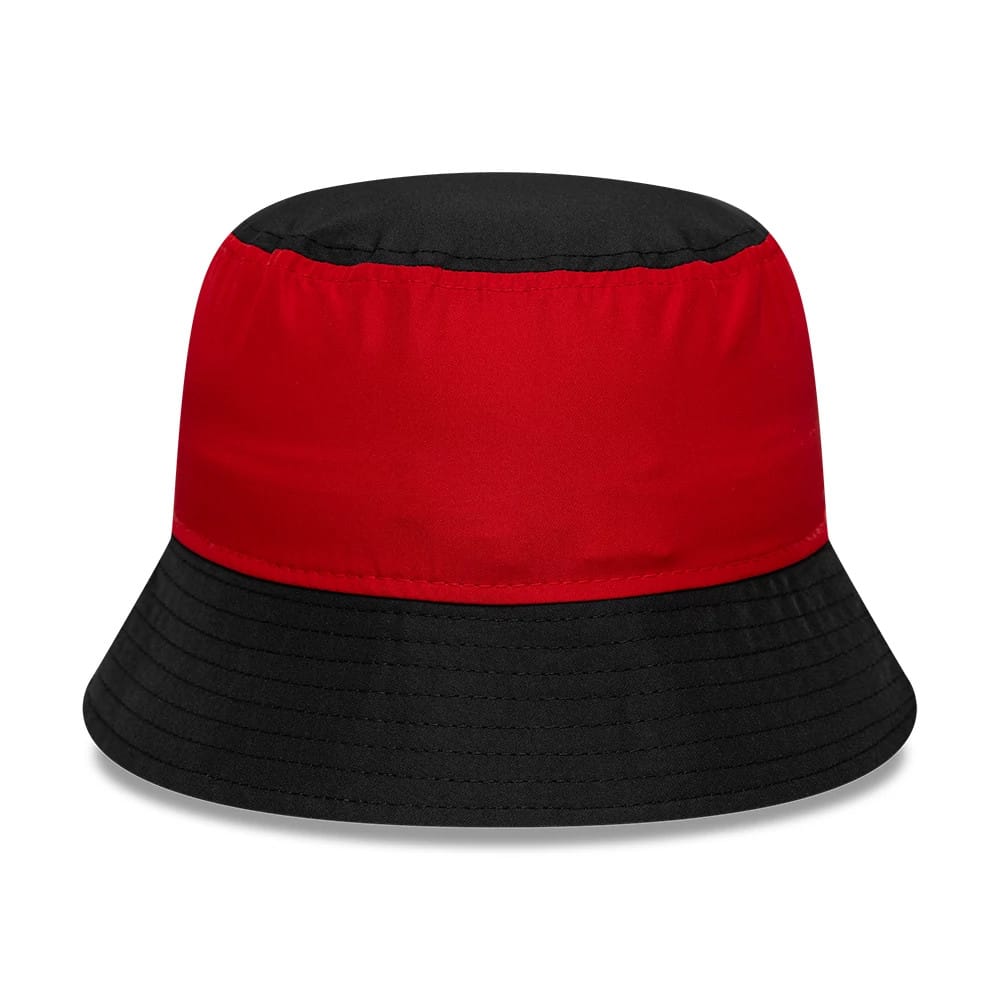 Youth Stade Toulousain Black New Era Bucket Hat, front view showing a two-tone design with a red band around the crown, a contrasting black top and visor, and a classic bucket hat silhouette with a slightly downward sloping visor.