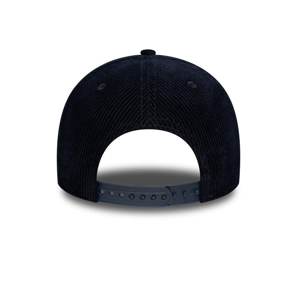 Chelsea FC Cord Navy New Era 9FORTY M-Crown Adjustable Cap, rear view showing the navy snap closure contrasting against the textured corduroy fabric of the crown, with stitching details around the rear panels.