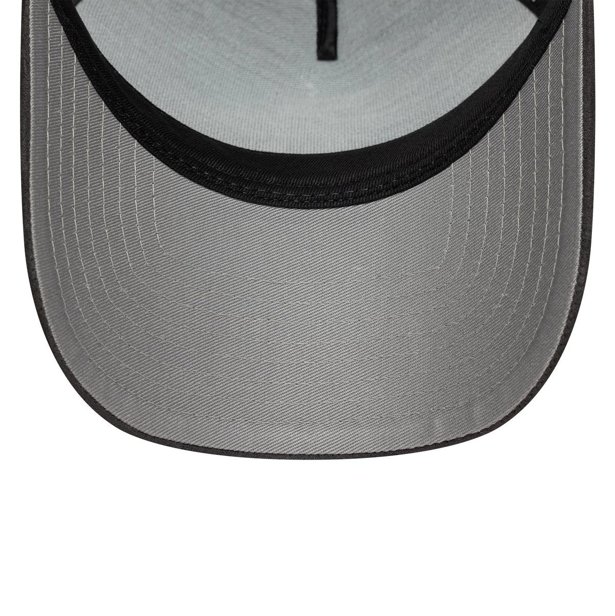 Aston Villa FC Faux Suede Dark Grey New Era 9FORTY E-Frame Trucker Adjustable Cap, inside view showing a light grey undervisor, a black internal seam running centrally down the crown's visor, and clean stitching lines along the edge.