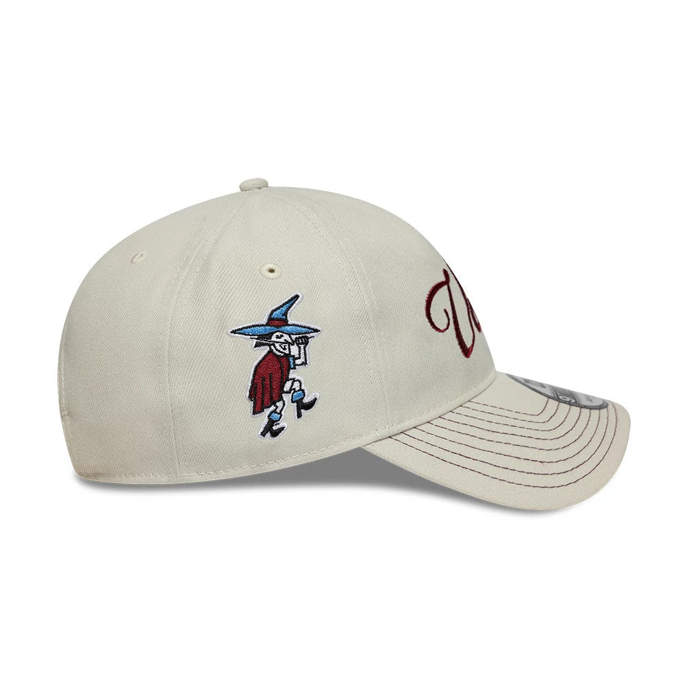 Aston Villa FC Villans White New Era 9TWENTY A-Frame Adjustable Cap, side view showing a detailed embroidered mascot in red, white, and blue on the right panel, with a curved visor featuring brown stitching and an attached 9TWENTY size sticker.