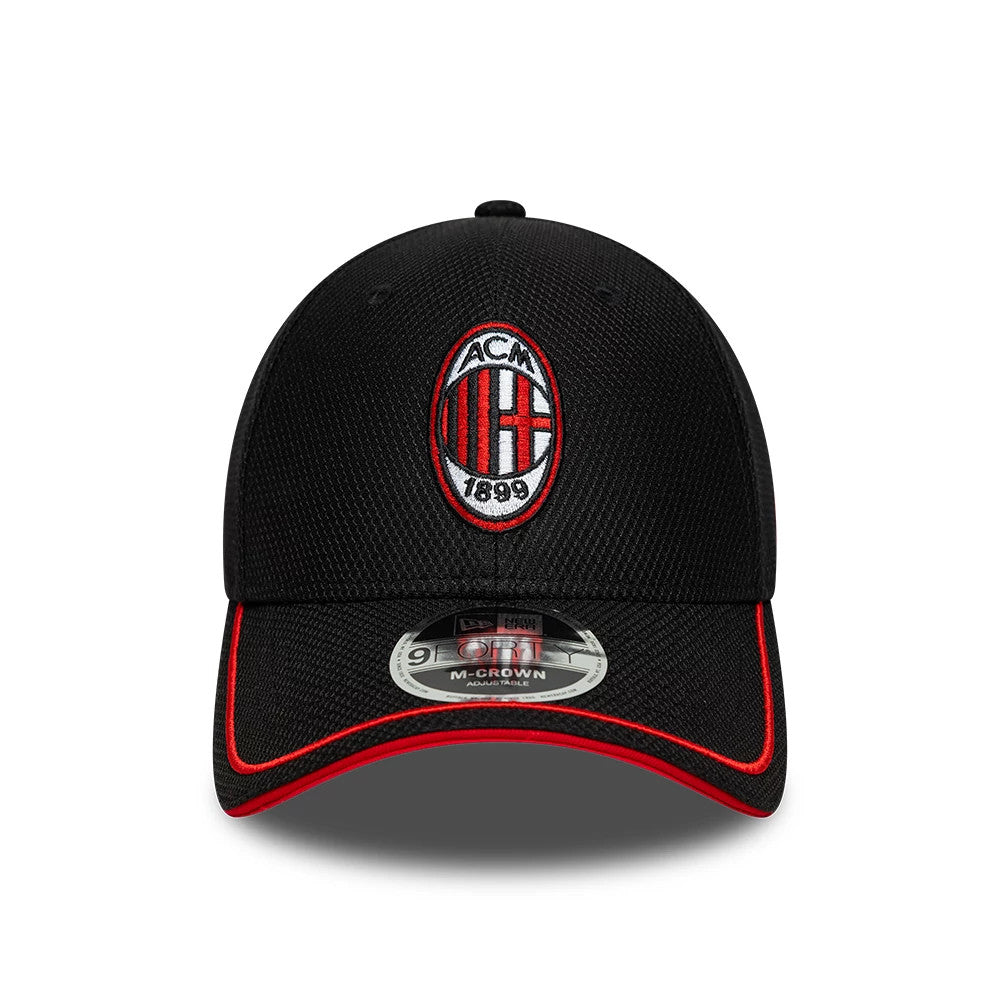 AC Milan Diamond Era Black New Era 9FORTY M-Crown Adjustable Cap, front view showing the raised embroidered AC Milan logo on the structured black crown, a red-edged visor, and a 9FORTY size sticker on the visor.