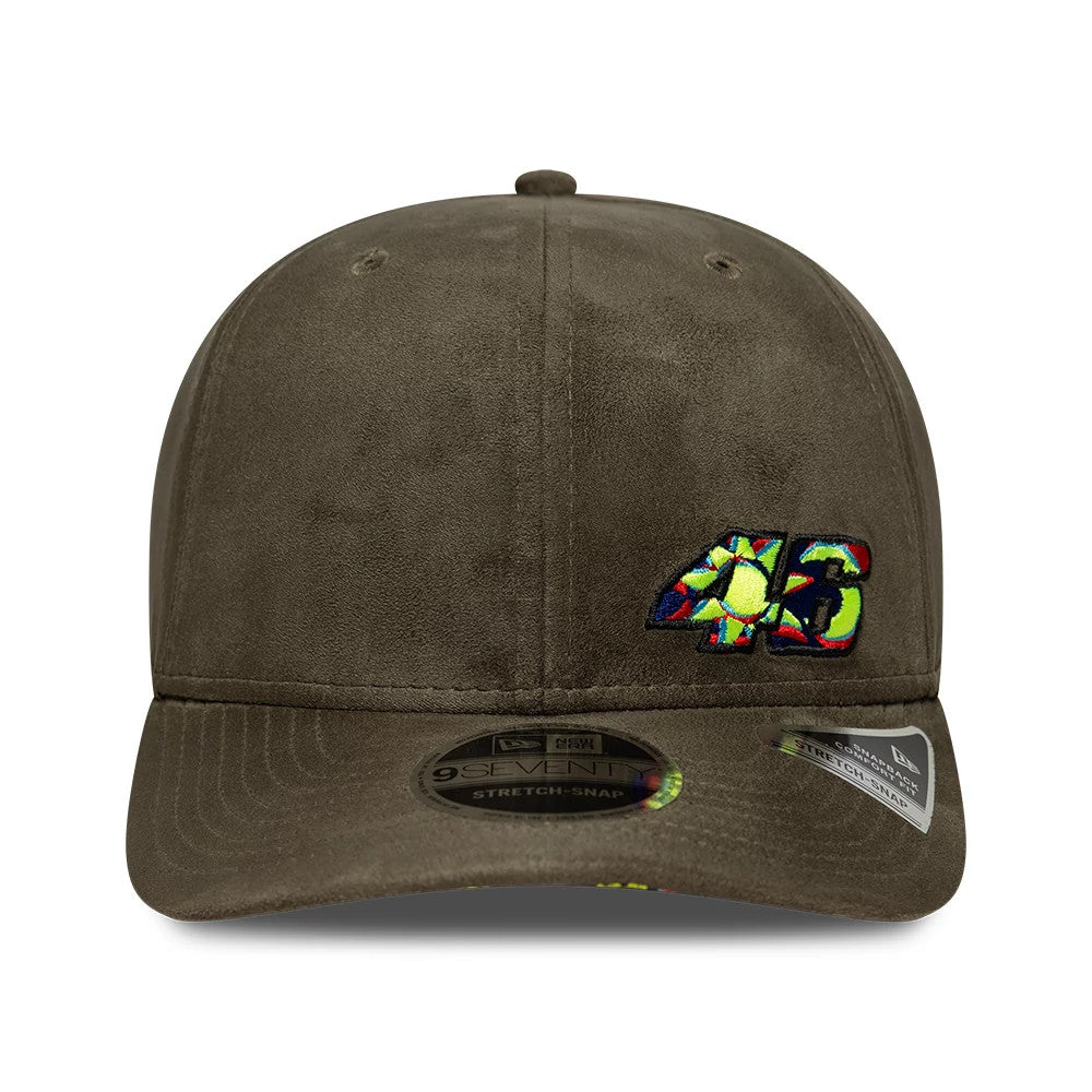 VR46 Flawless Green New Era 9SEVENTY Stretch Snap Adjustable Cap, front view showing a colourful 46 graphic embroidered on the right front panel, a brown flat visor, and a 9SEVENTY size sticker in the centre.