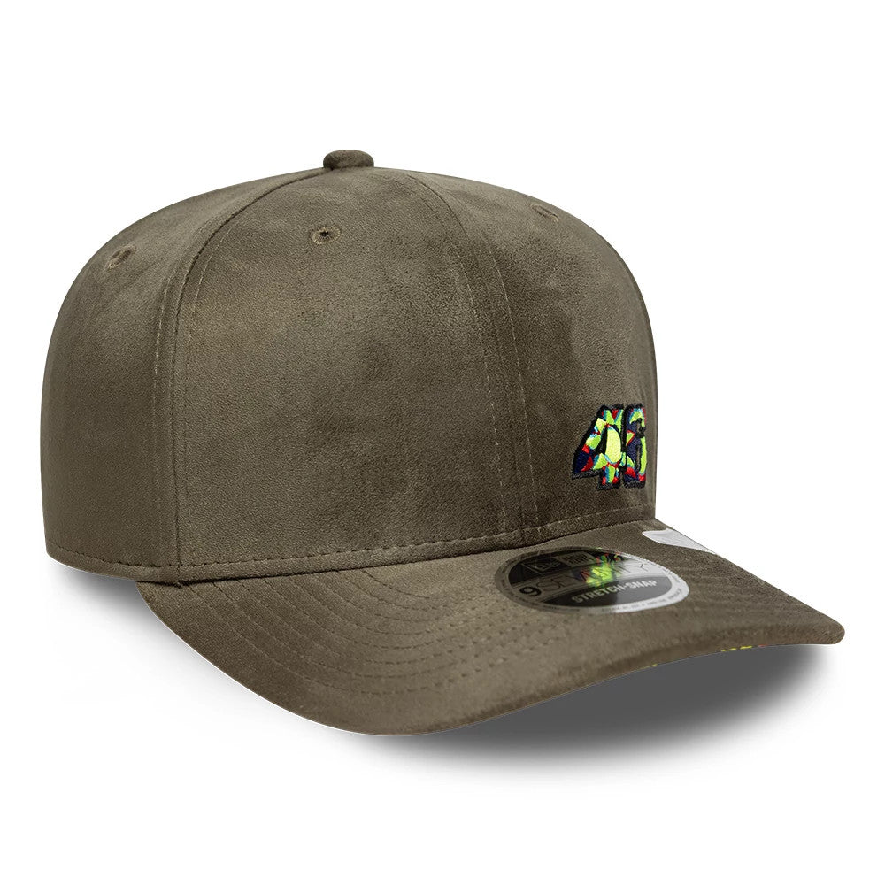 VR46 Flawless Green New Era 9SEVENTY Stretch Snap Adjustable Cap, three-quarter view showing a yellow and green embroidered 46 logo on the front panel, with a curved green visor and the 9SEVENTY size sticker in the centre.