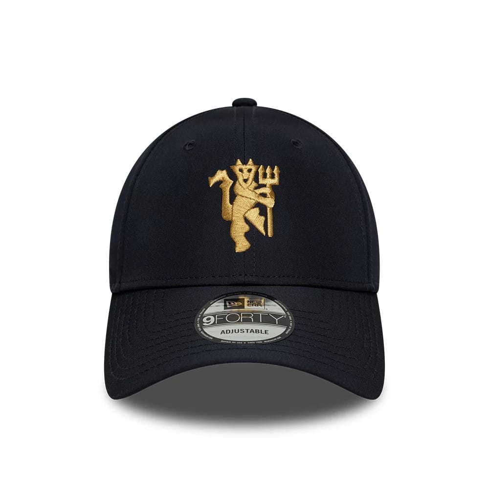 Pictured is this Manchester United FC Gold 9FORTY cap in navy. 2