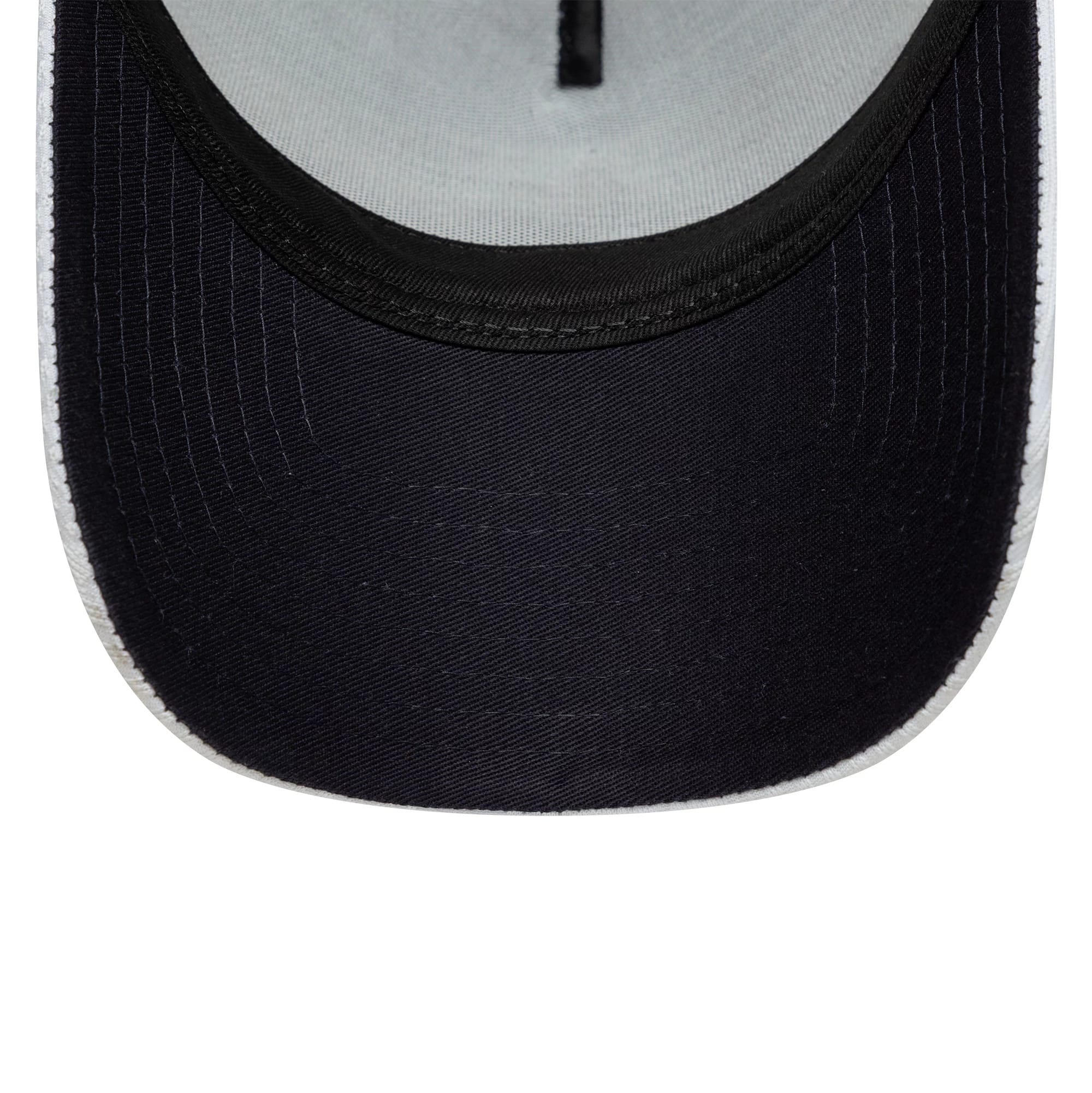 Pictured is this Tottenham Hotspur FC Pattern Knit 9FORTY E-Frame Trucker cap in white. 2