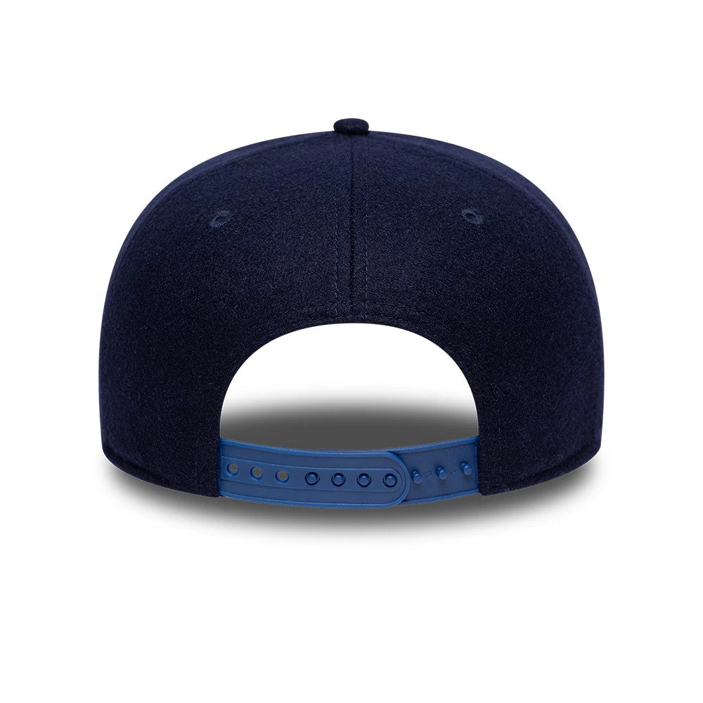 Chelsea FC London Wool Navy New Era 19TWENTY Adjustable Cap, rear view showing the structured navy crown with two embroidered eyelets, a wool finish, and a blue adjustable snap closure for a customised fit.