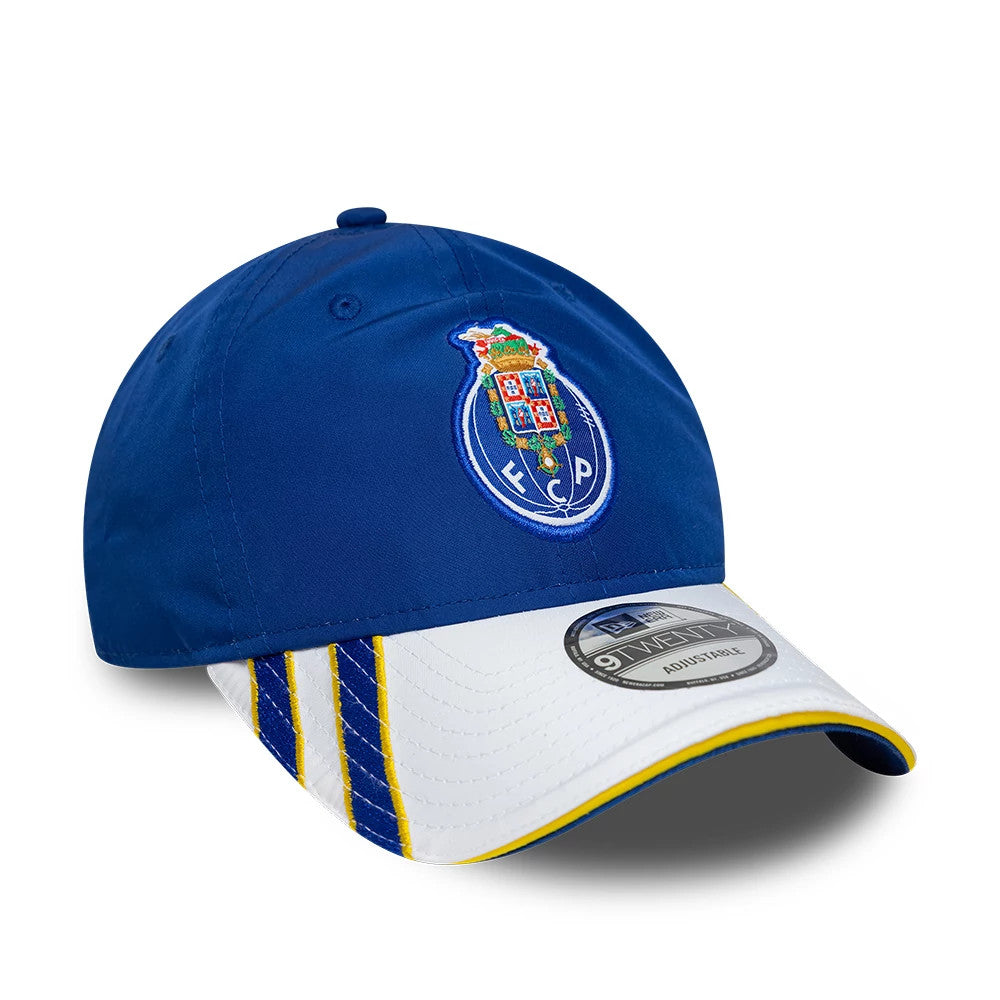 FC Porto 03 Blue New Era 9TWENTY Adjustable Cap, three-quarter view showing the blue and white embroidered club crest on the front panel, a white curved visor with blue and yellow stripes, and a 9TWENTY size sticker.