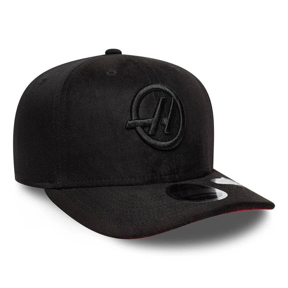 Pictured is this TGR Haas F1 Team Suede 9SEVENTY Stretch Snap cap in black. 4