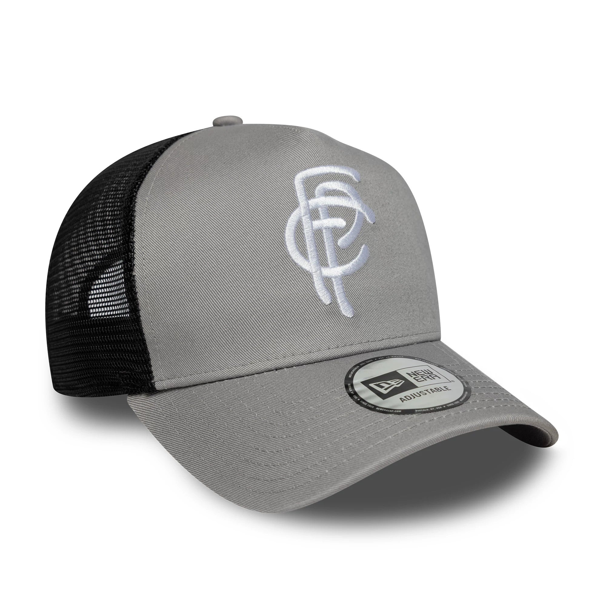 FC Porto Grey New Era 9FORTY A-Frame Trucker Adjustable Cap, three-quarter view showing a white embroidered FC logo on the front panel, complemented by a black mesh back and a curved grey visor with a 9FORTY size sticker.