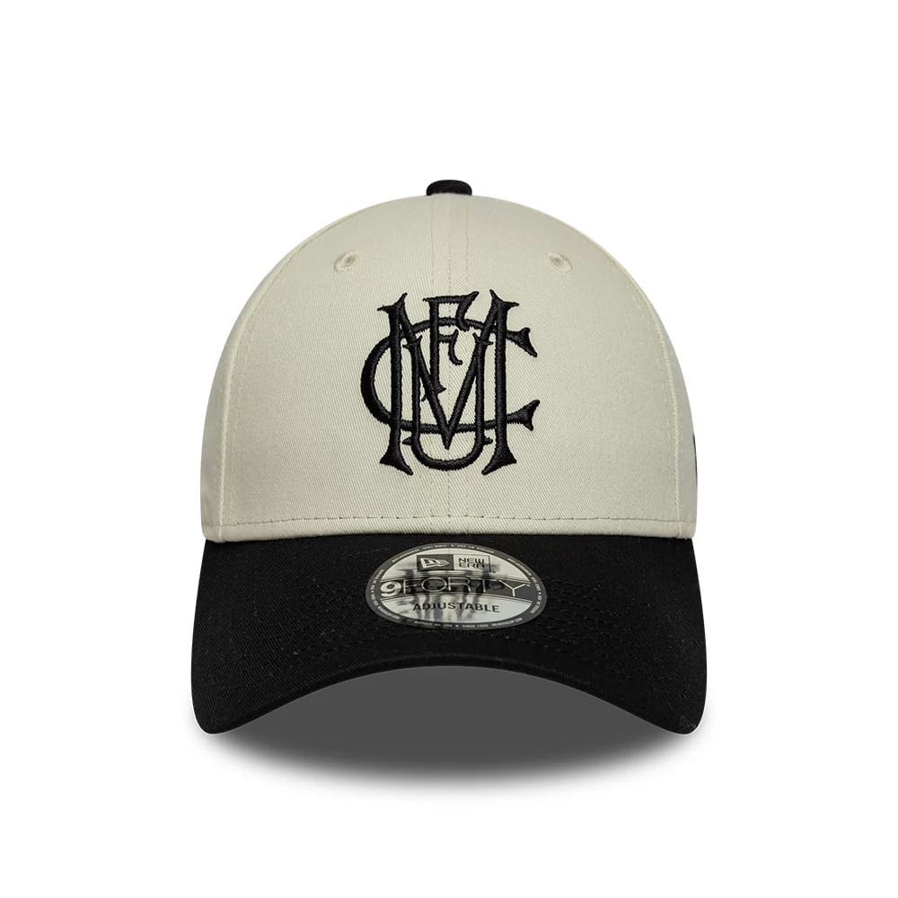 Pictured is this Manchester United FC Monogram 9FORTY cap in cream & black. 2