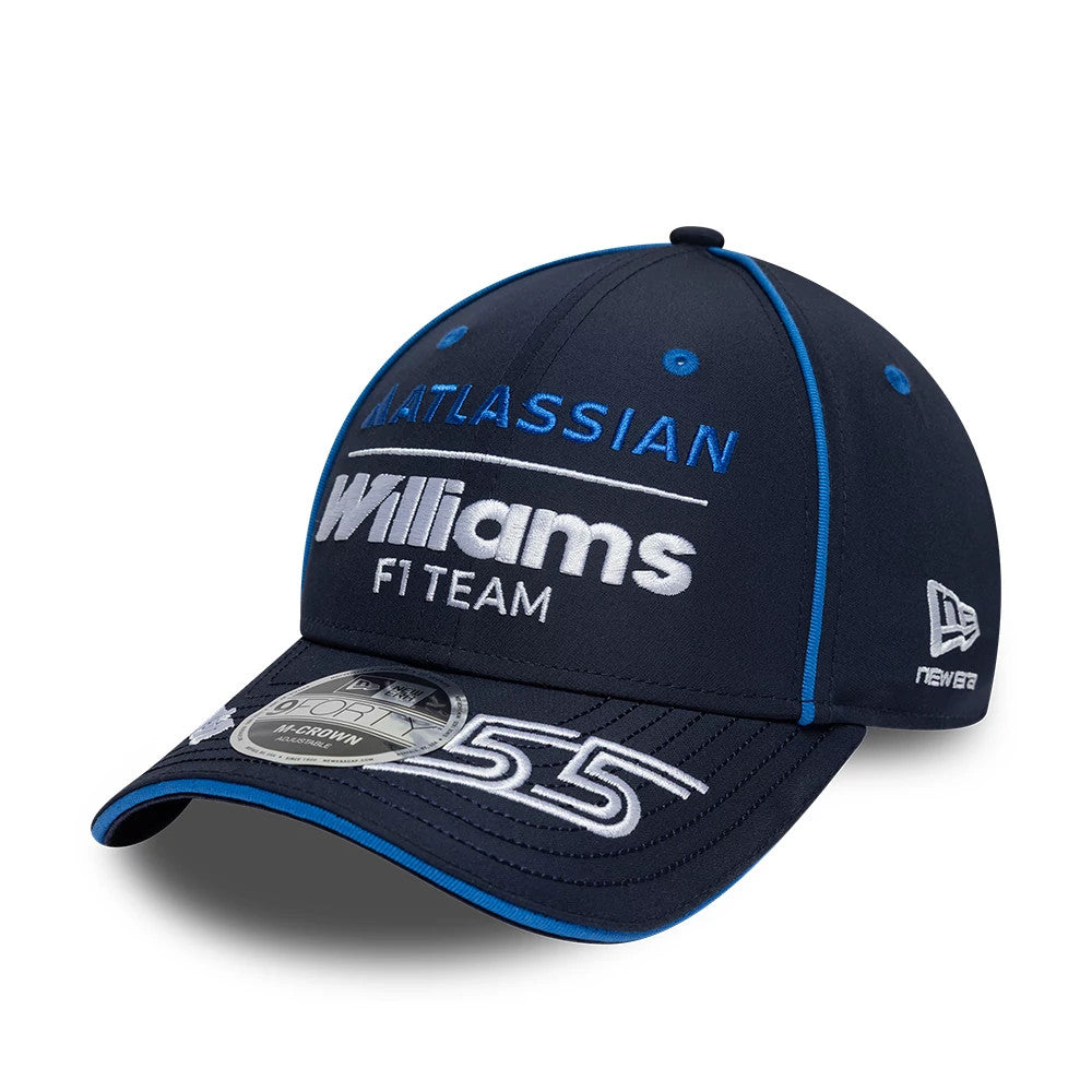 Williams Carlos Sainz Navy New Era 9FORTY M-Crown Adjustable Cap, three-quarter view showing raised white and blue embroidered Williams F1 Team logo on the front panel, the 9FORTY size sticker on the navy curved visor.