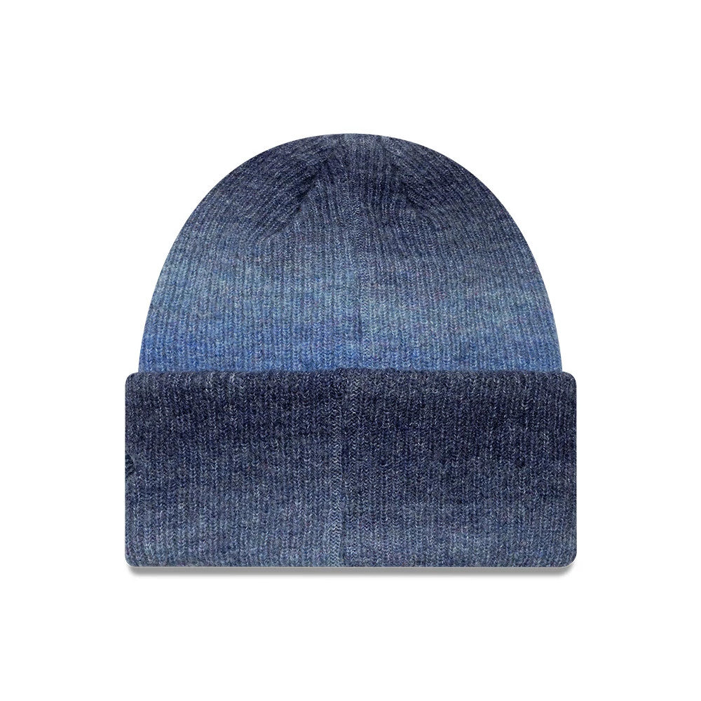 New Era New York Yankees Womens MLB Ombre Navy Cuff Knit Beanie Hat, front view showing the gradient ombre effect transitioning from dark navy at the cuff to lighter shades towards the crown, with a ribbed texture throughout.