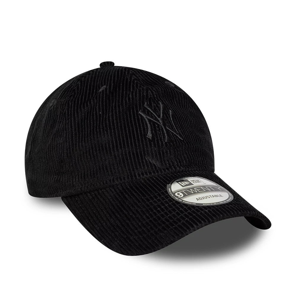 New York Yankees MLB Cord Black New Era 9TWENTY Adjustable Cap, front view showing a black raised embroidered Yankees logo on the structured corduroy crown, with a matching black curved visor featuring a 9TWENTY size sticker.
