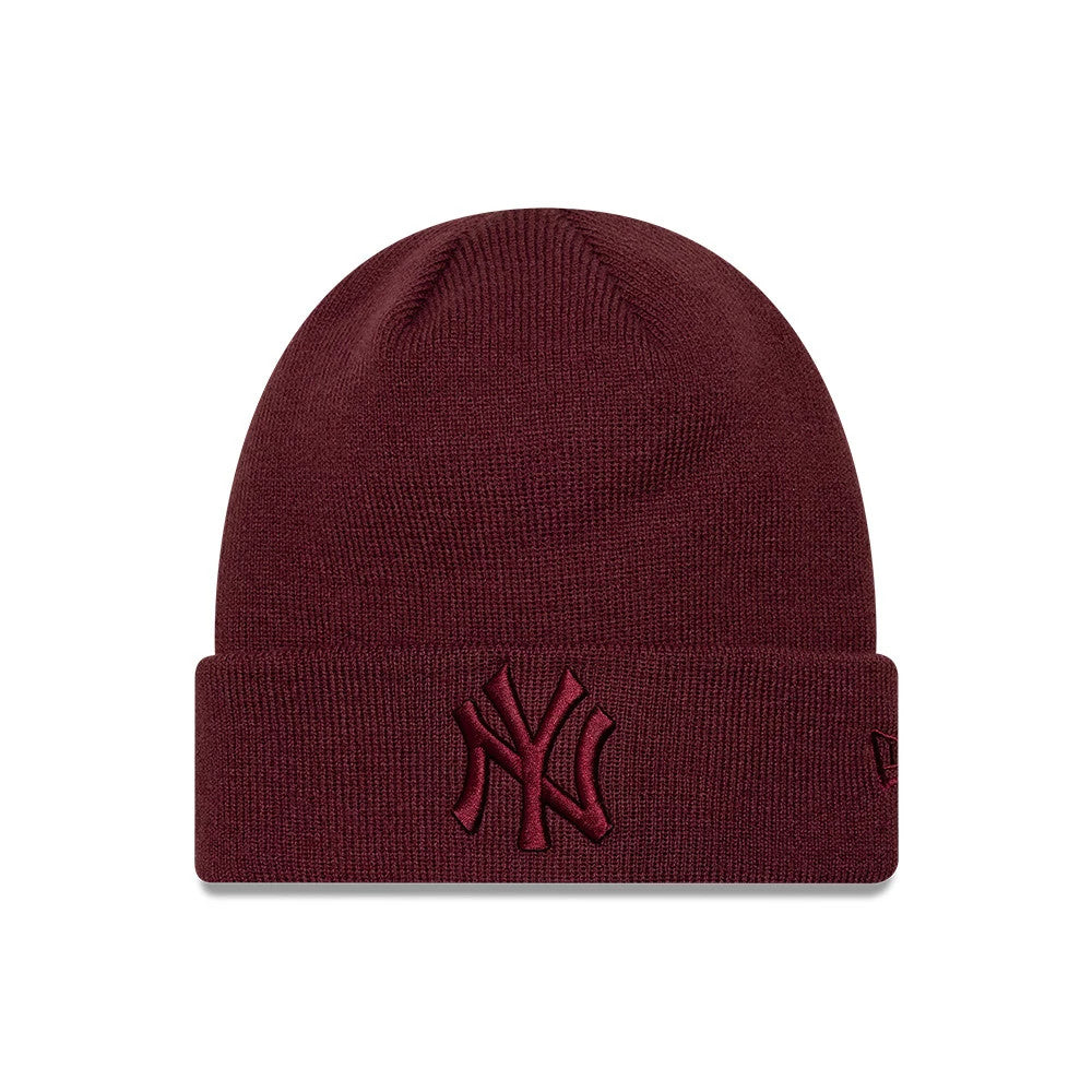 New Era New York Yankees MLB League Essential Dark Red Cuff Knit Beanie Hat, front view showing a raised dark red embroidered Yankees logo centred on the cuff, with a knit texture and the New Era flag logo on the left side.